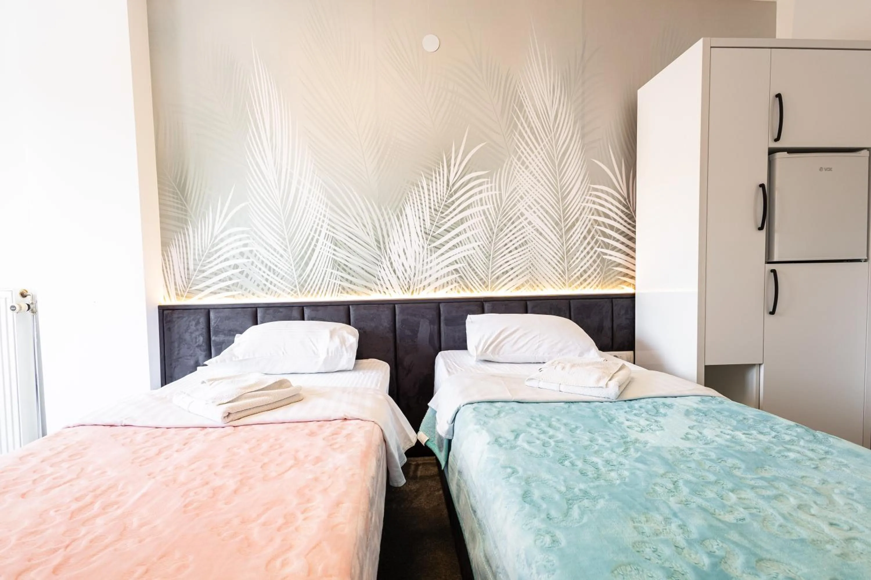 Bed in Garni Hotel Lotos