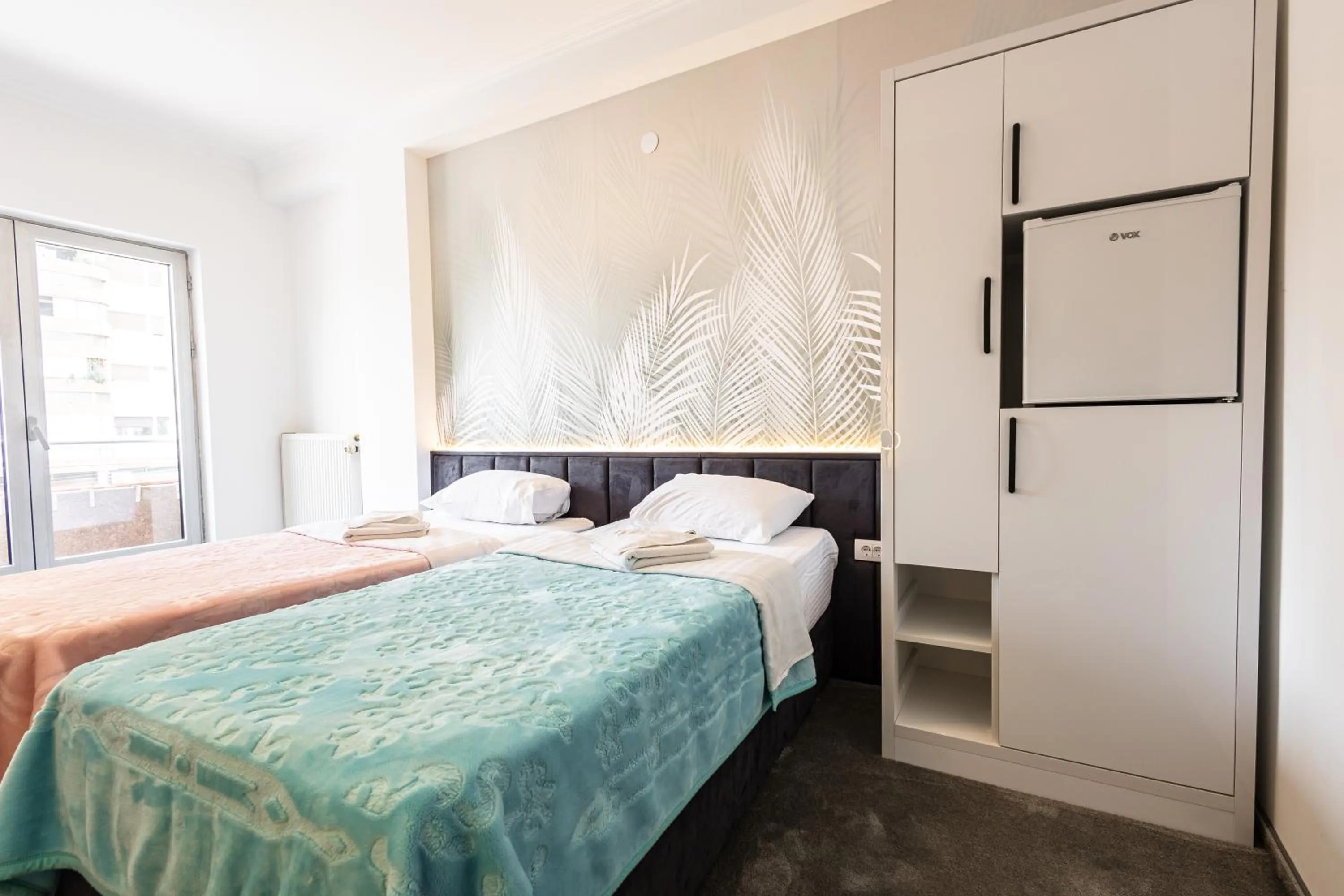 Bed in Garni Hotel Lotos