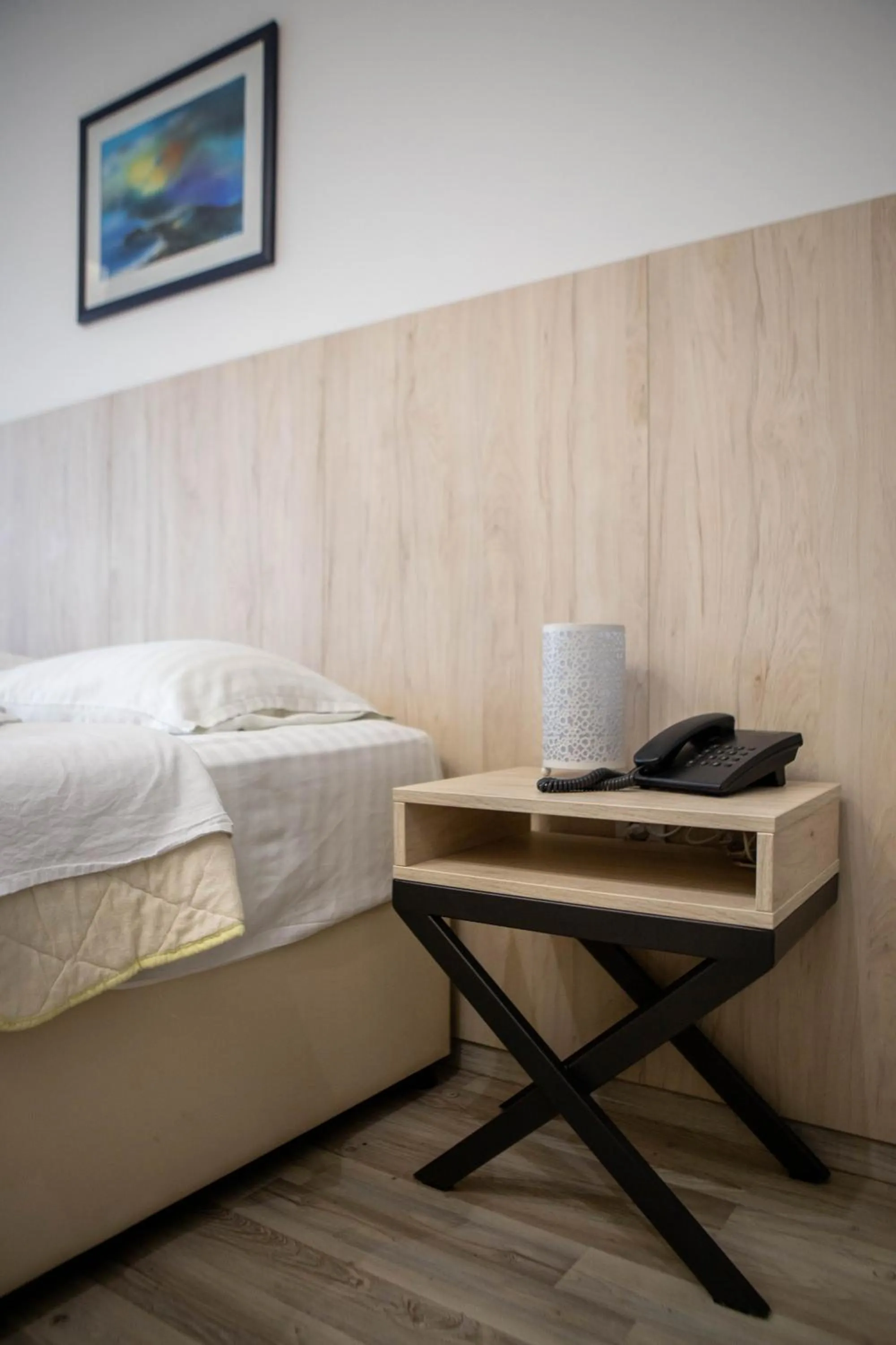 Bed in Garni Hotel Lotos