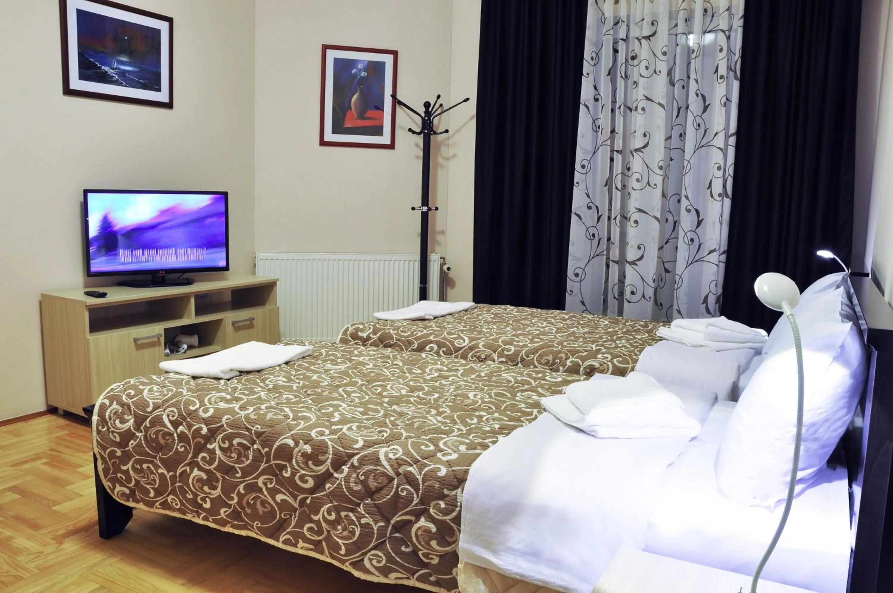 Bed in Garni Hotel Lotos