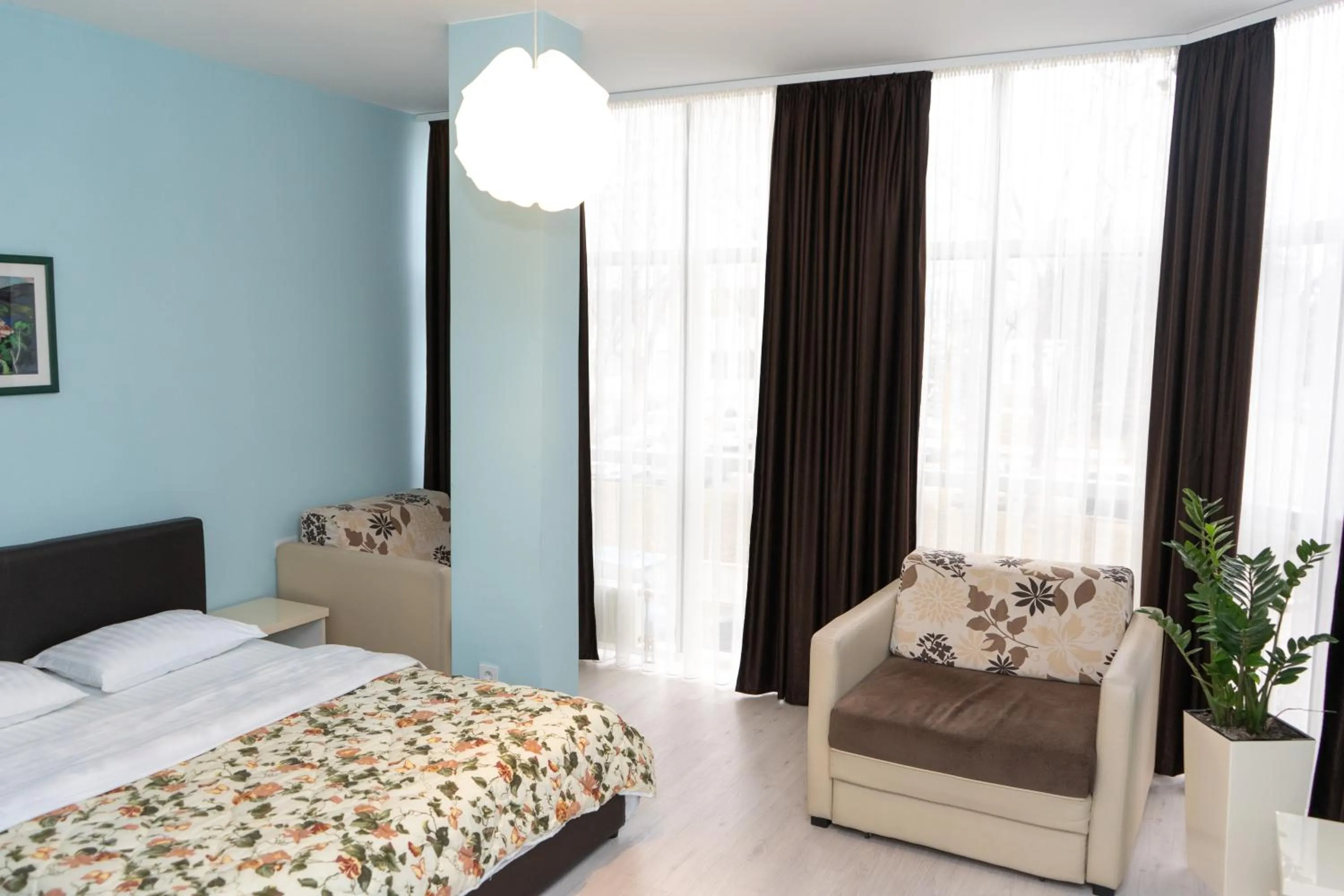 Seating area, Bed in Garni Hotel Lotos