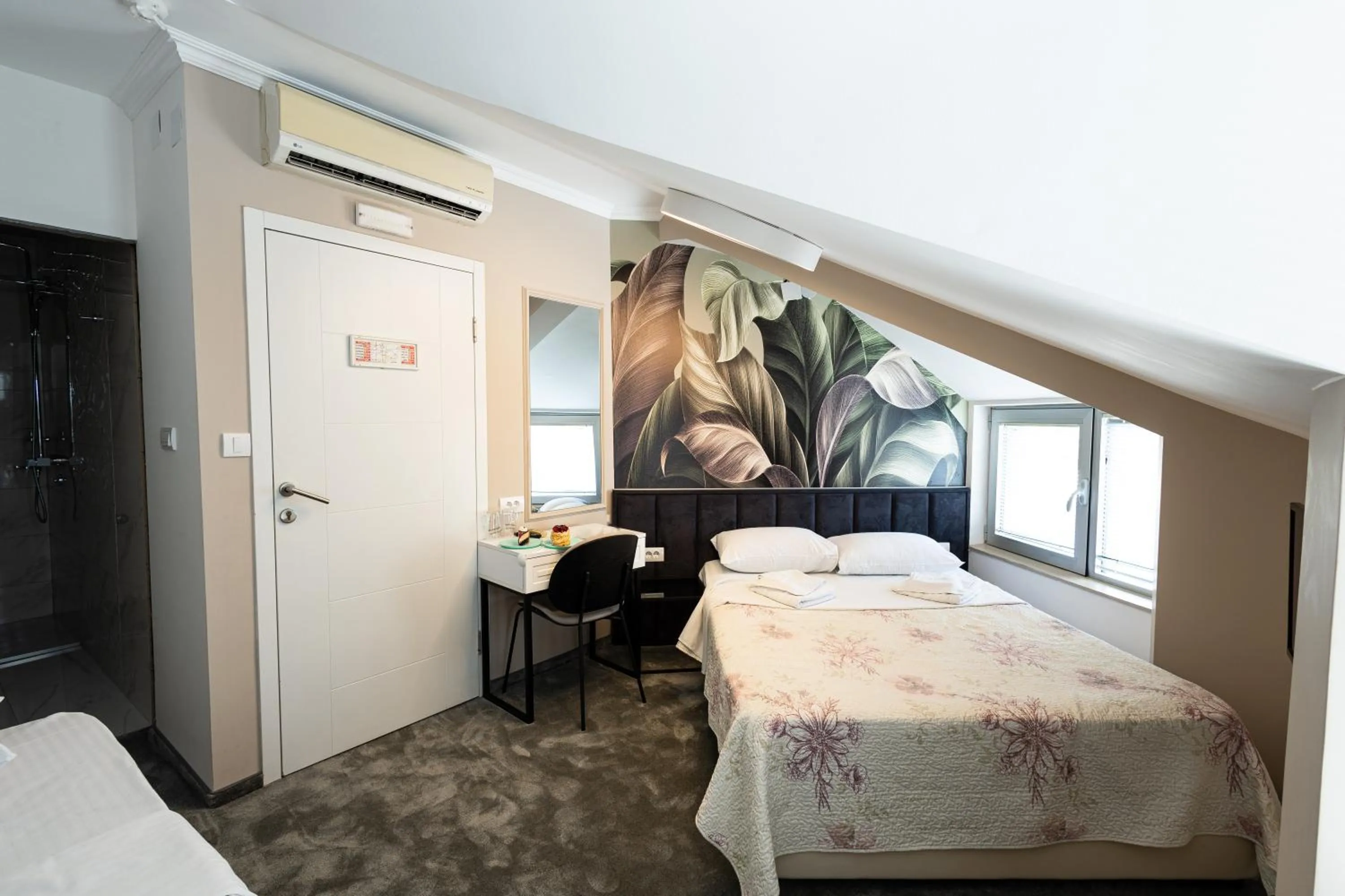 Photo of the whole room, Bed in Garni Hotel Lotos