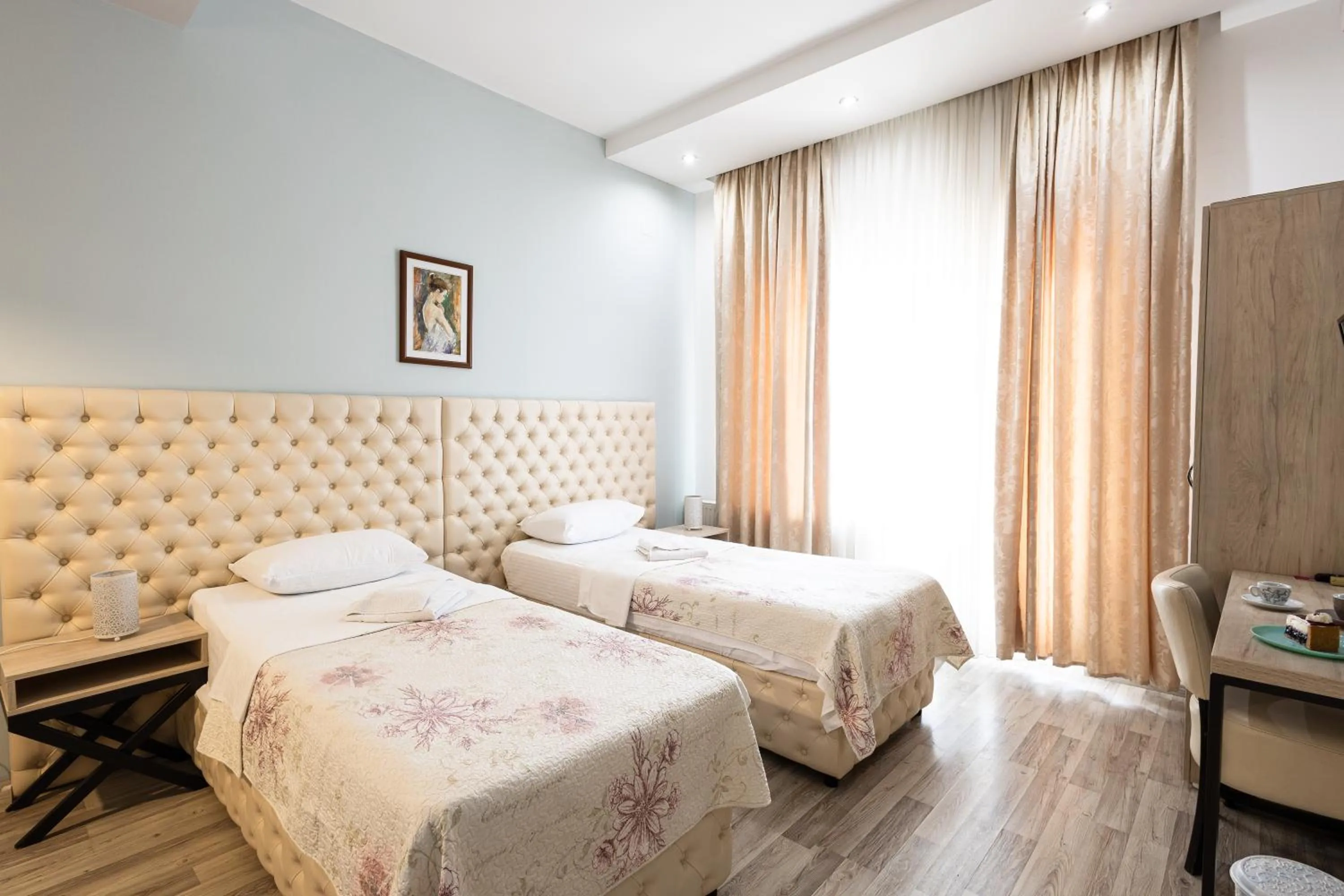 Bed in Garni Hotel Lotos