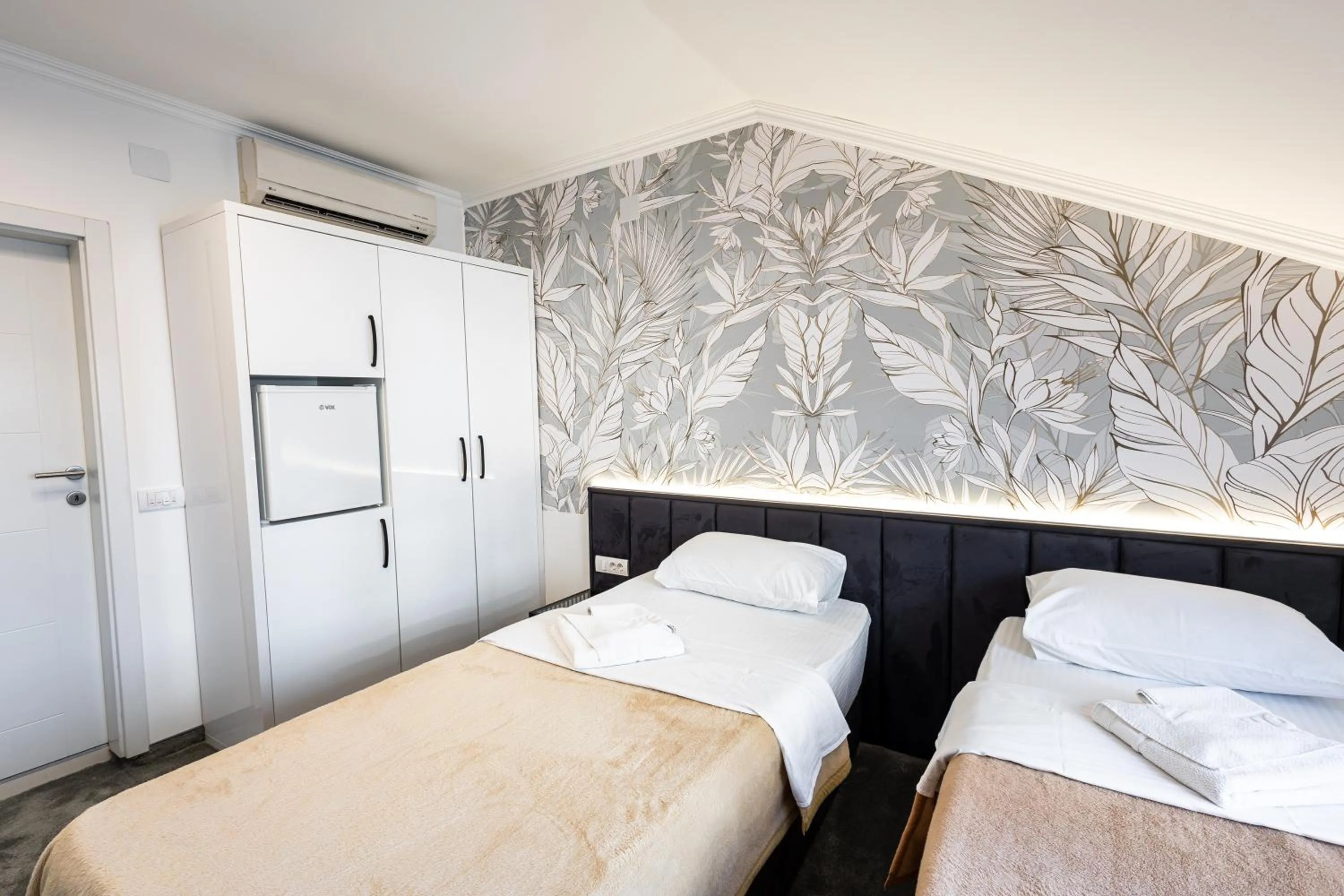 Photo of the whole room, Bed in Garni Hotel Lotos