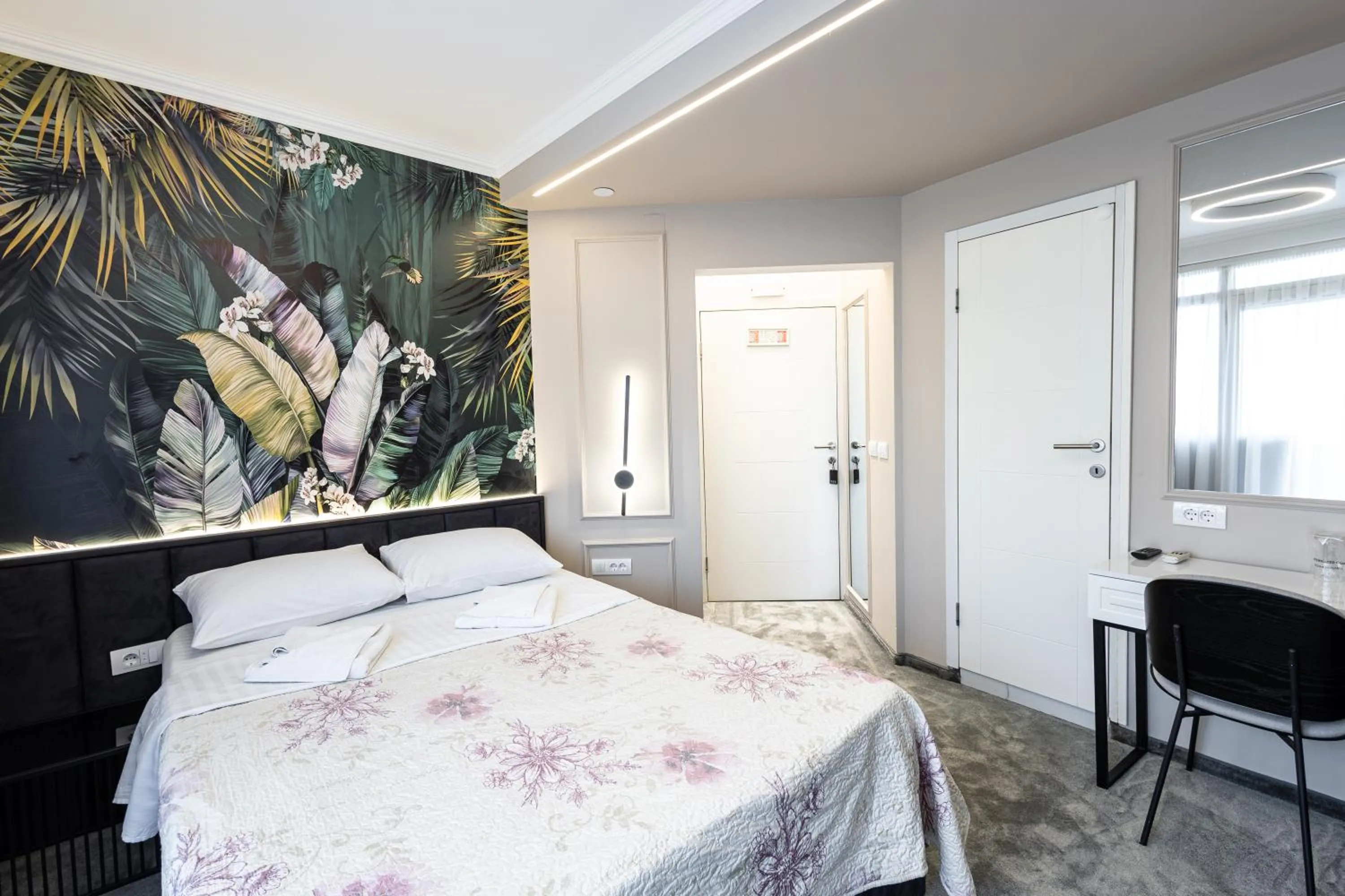 Bed in Garni Hotel Lotos