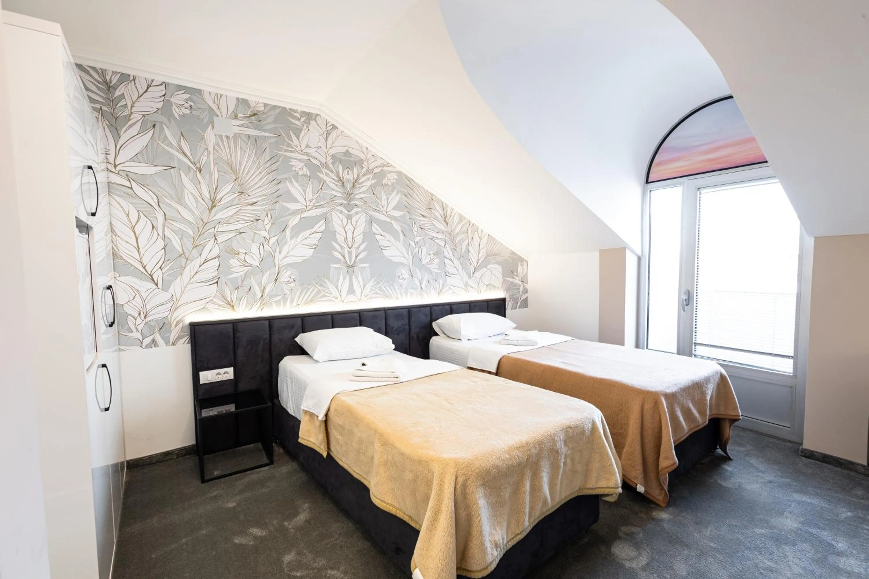 Bed in Garni Hotel Lotos