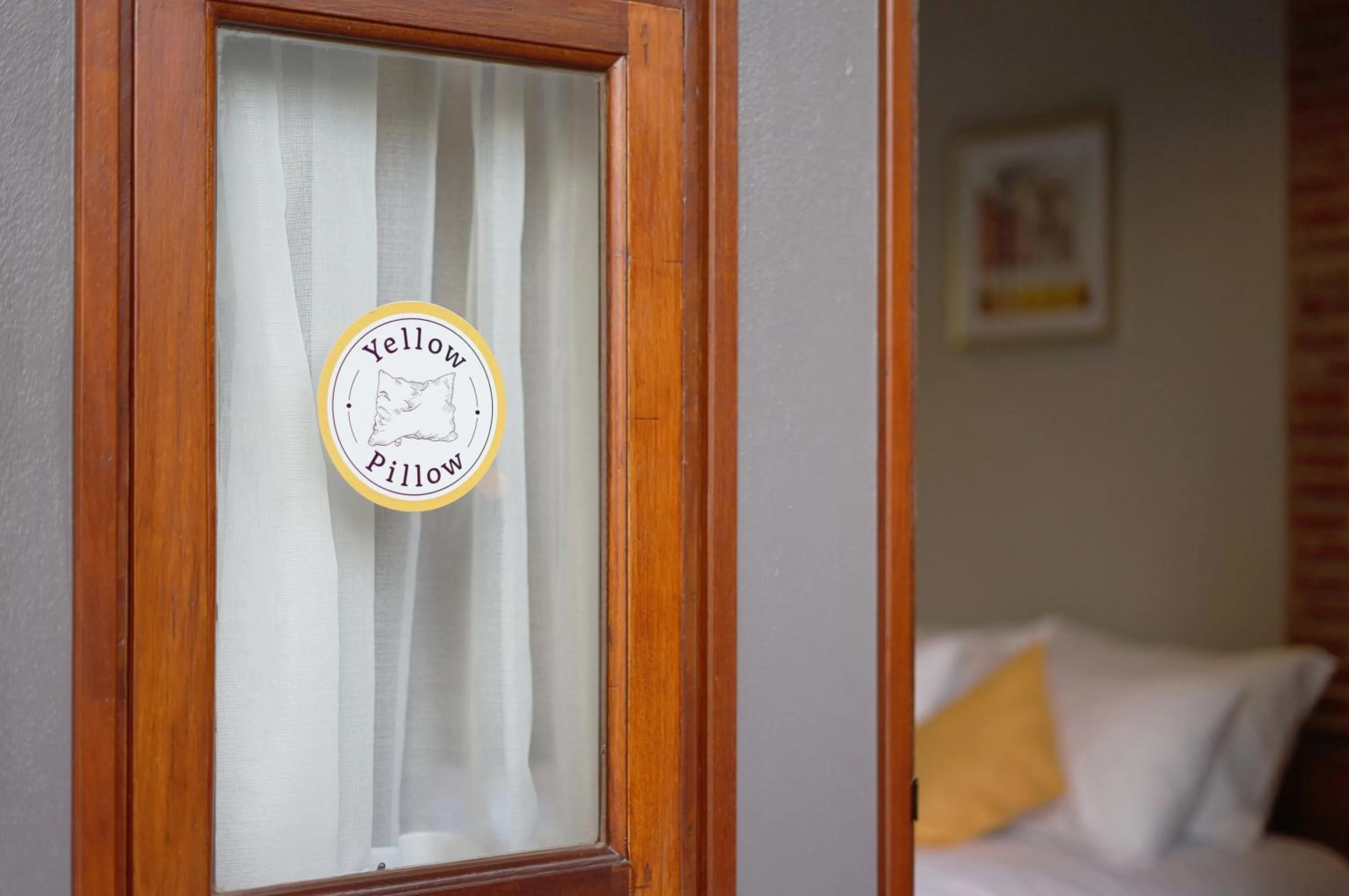 Property logo or sign, Bed in Yellow Pillow village