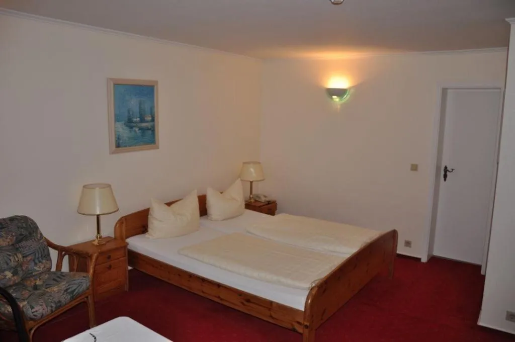 Bedroom in Hotel-Café Kampe