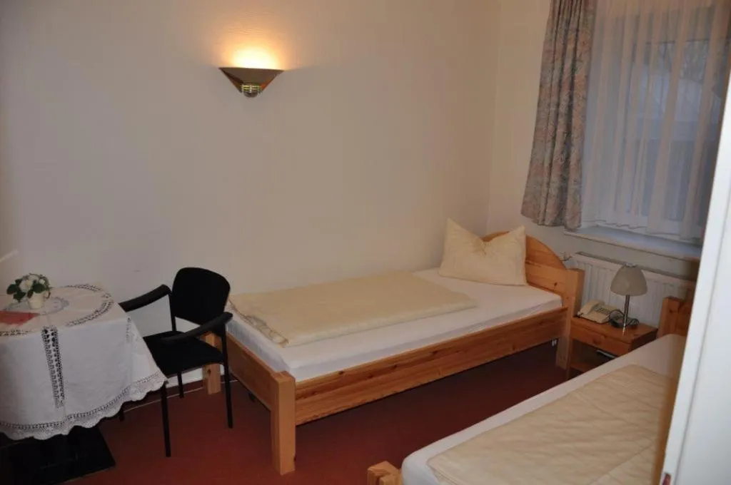 Bedroom in Hotel-Café Kampe