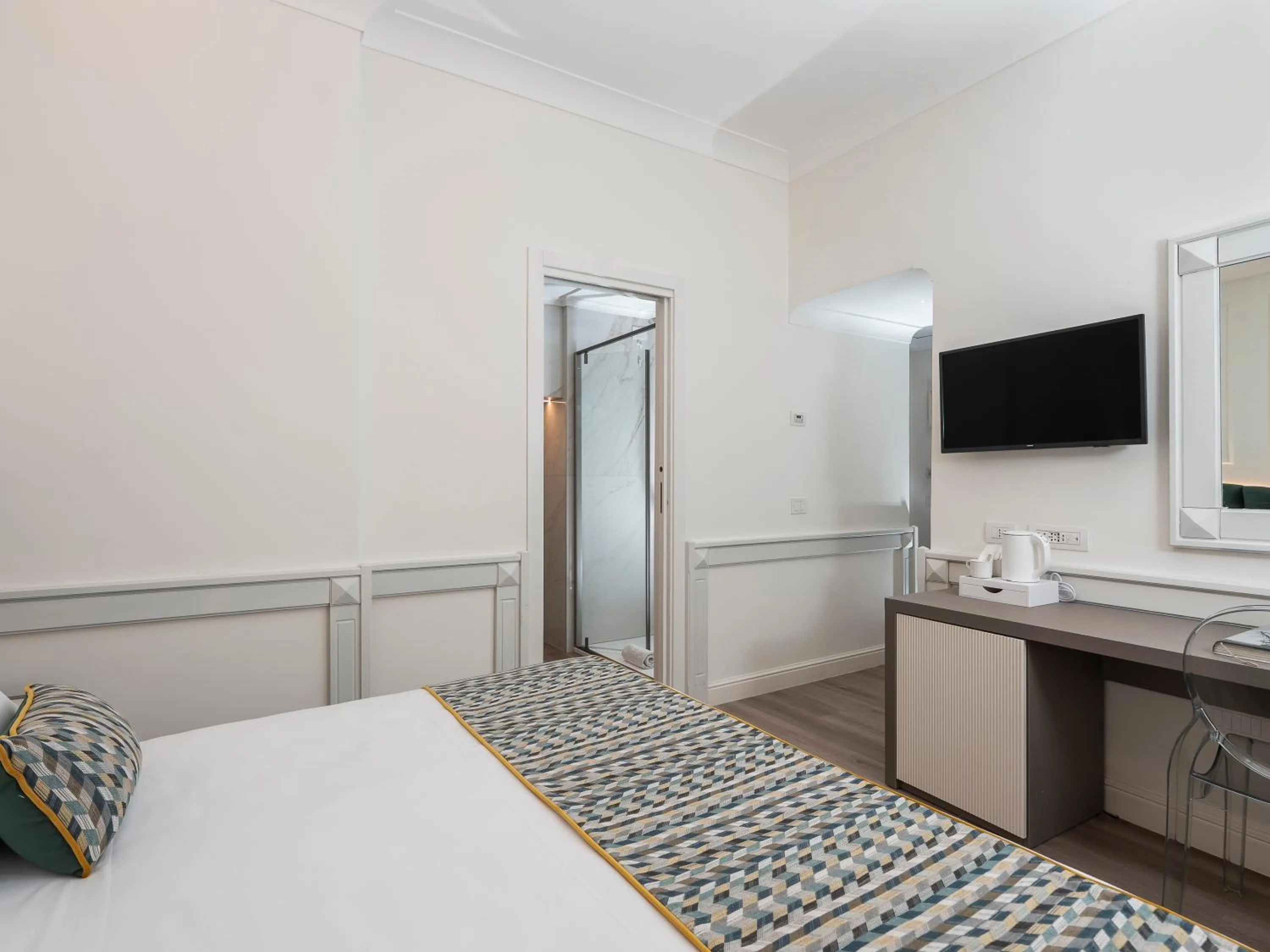 Bed in Hotel Michelangelo