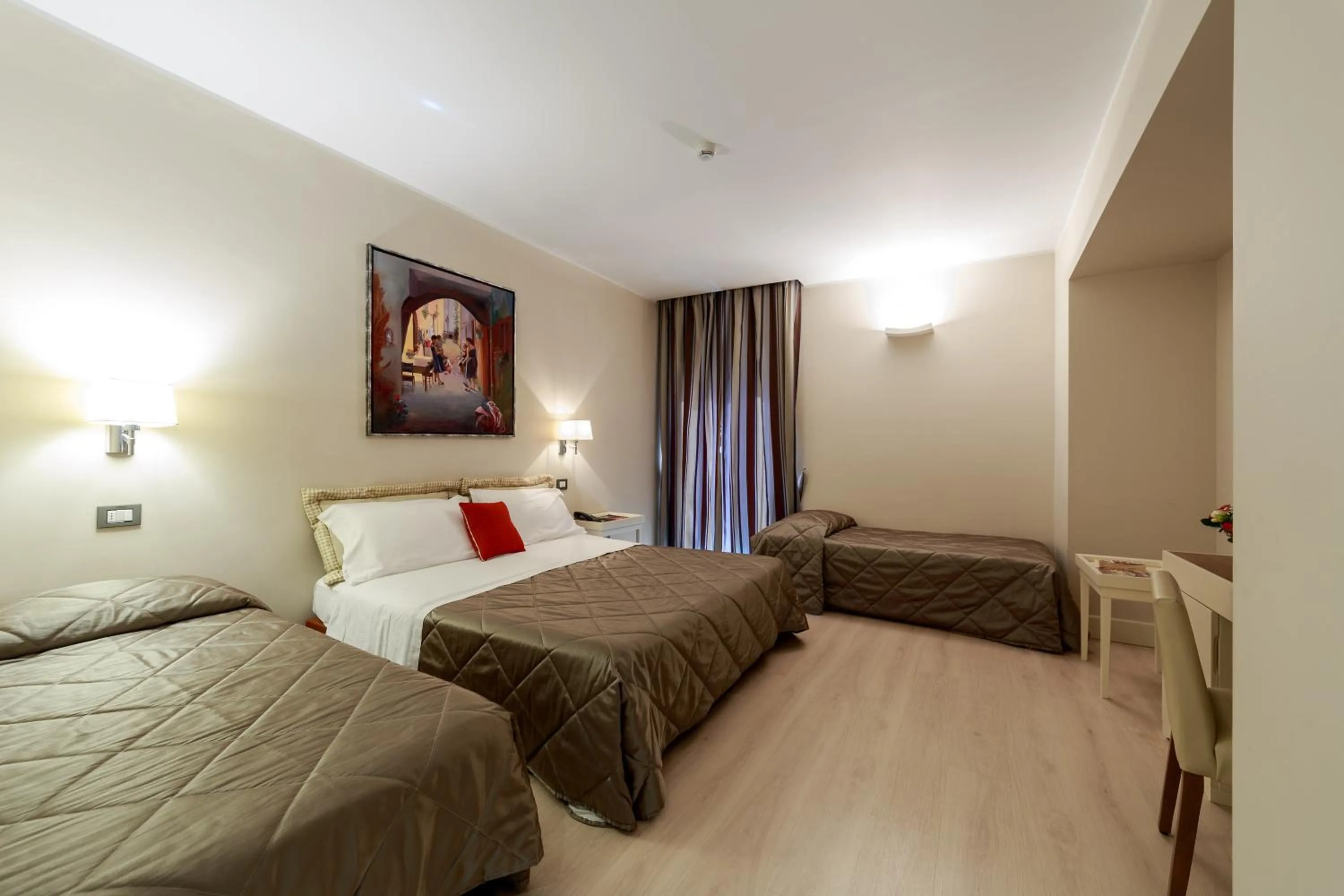 Bed in Hotel Mirasole International