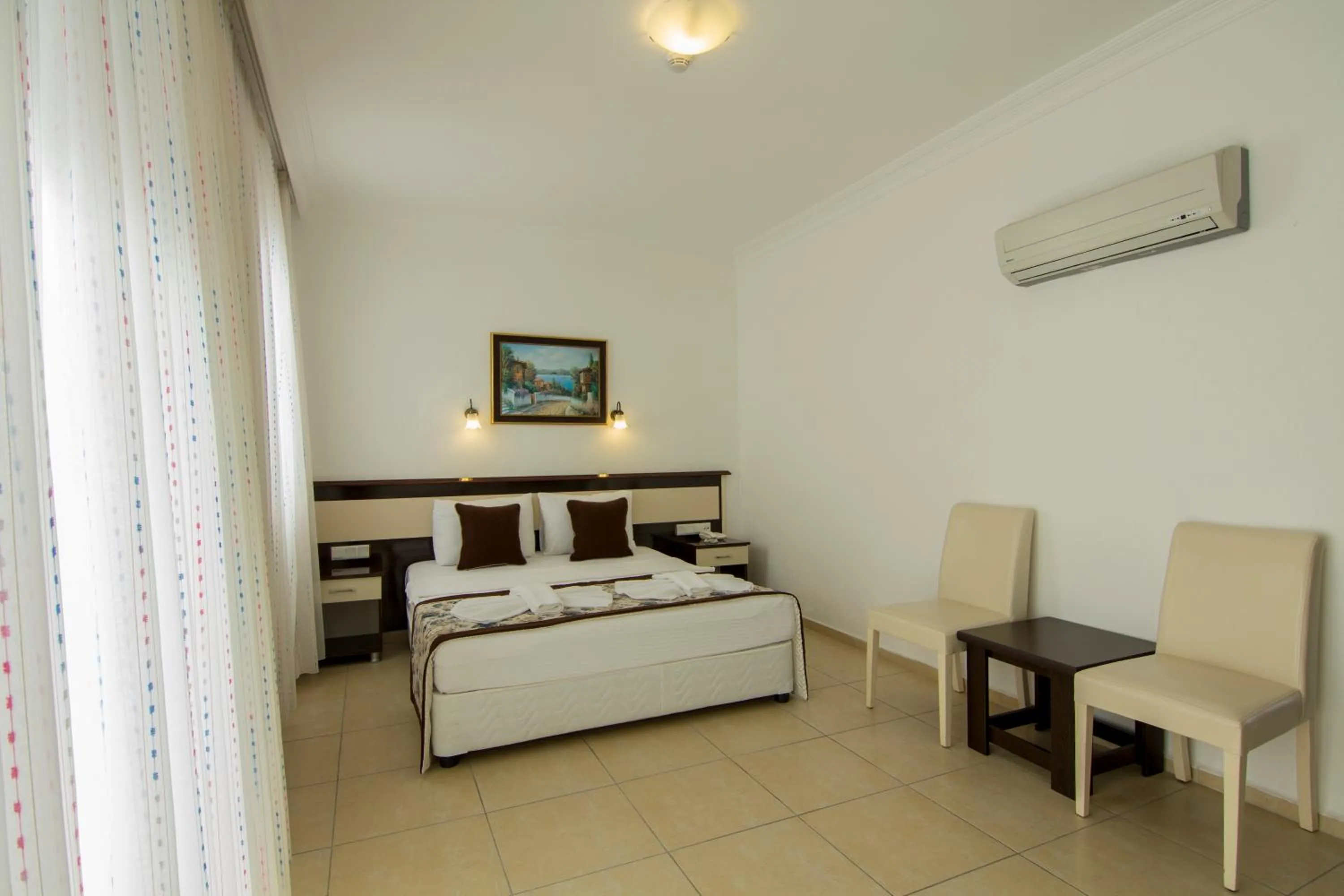 Bed in Belcekum Beach Hotel