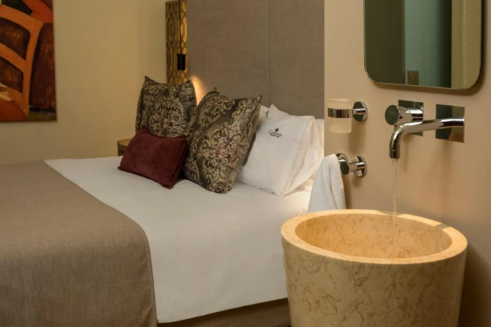 Bed in ELG Contessa Boutique Hotel