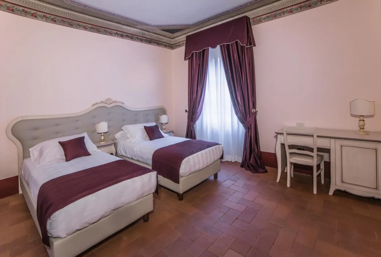 Bed in Relais Corte Rodeschi
