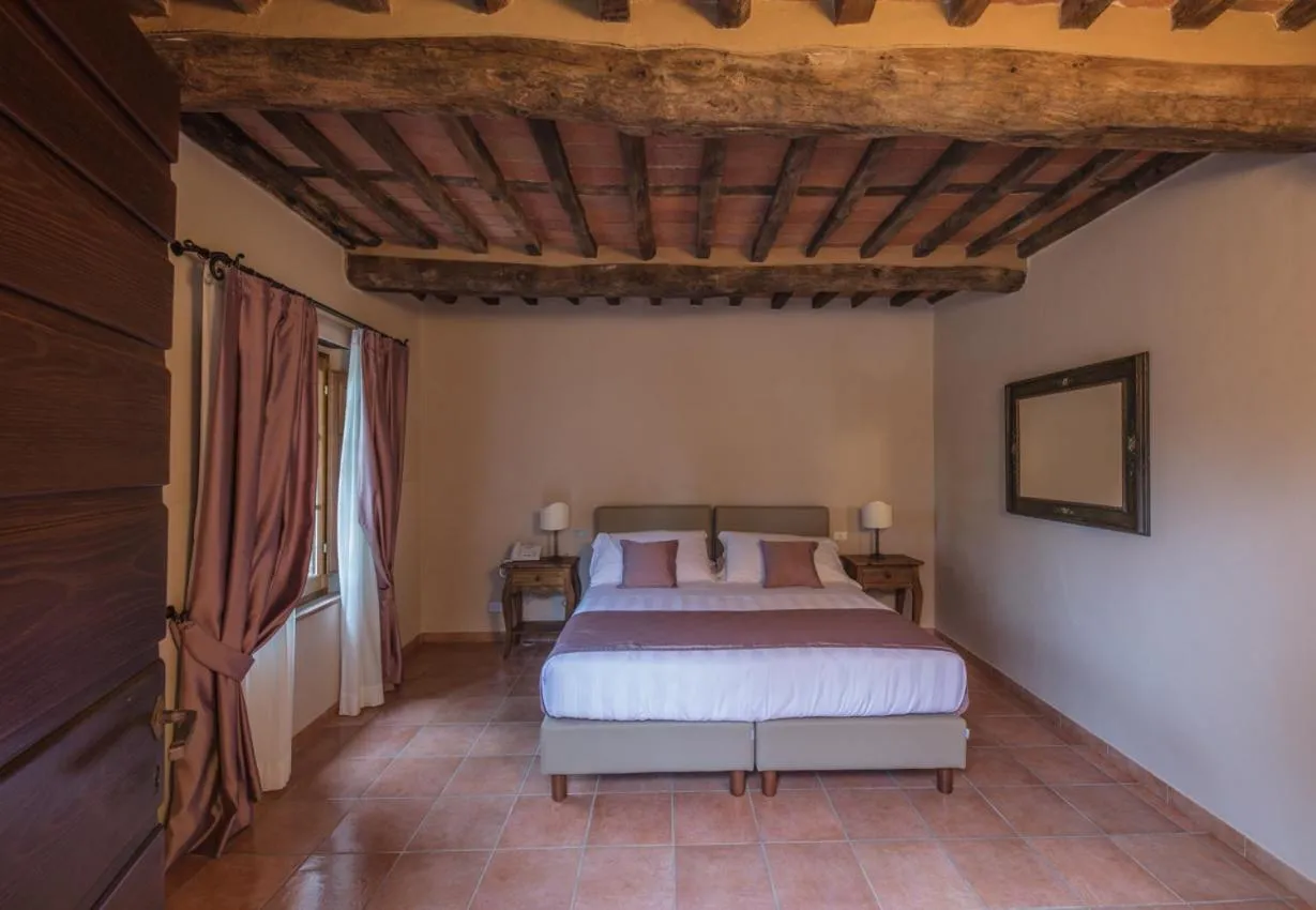 Bed in Relais Corte Rodeschi