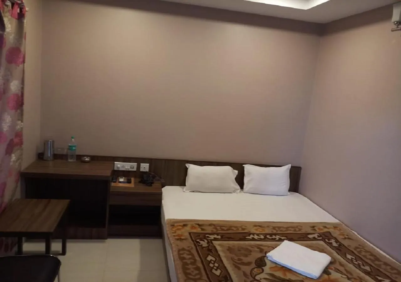 Bed in Hotel Raj Palace