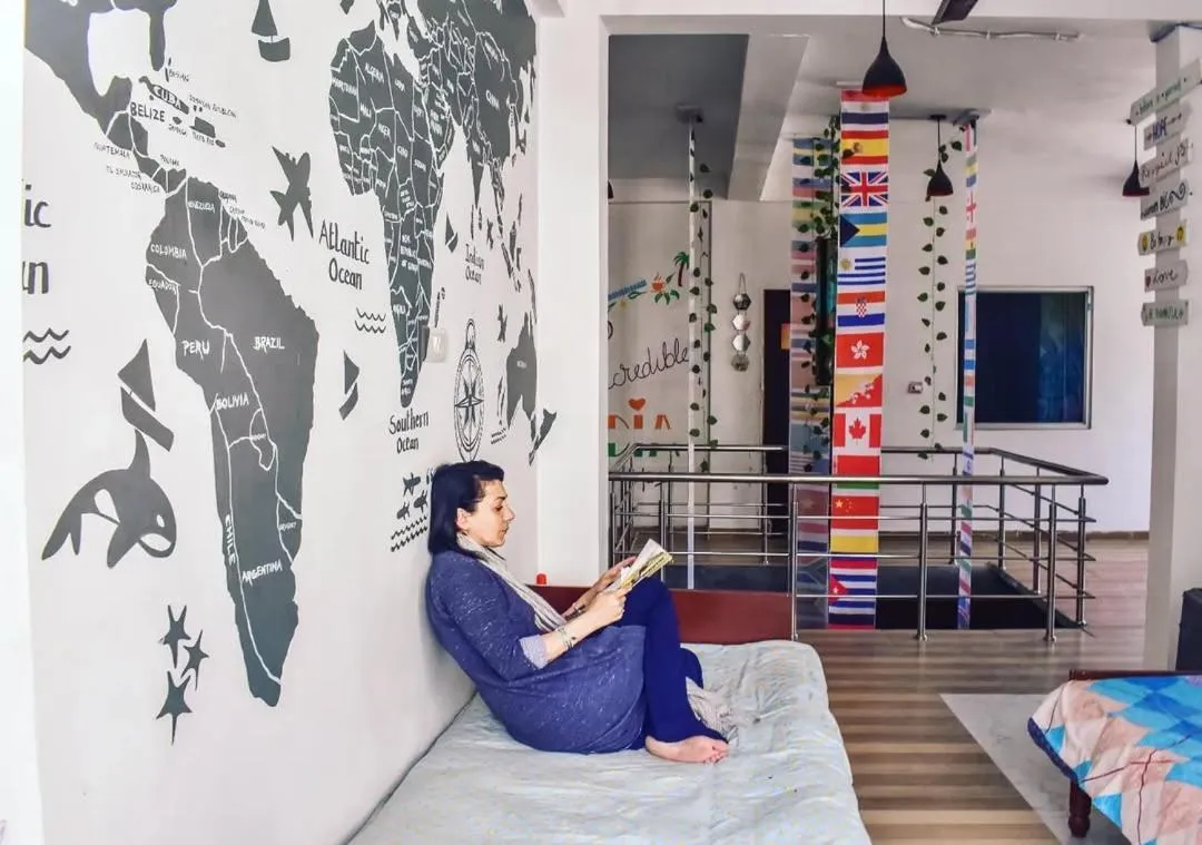 Communal lounge/ TV room, Bed in Skyard Hostel Rishikesh Laxman Jhula