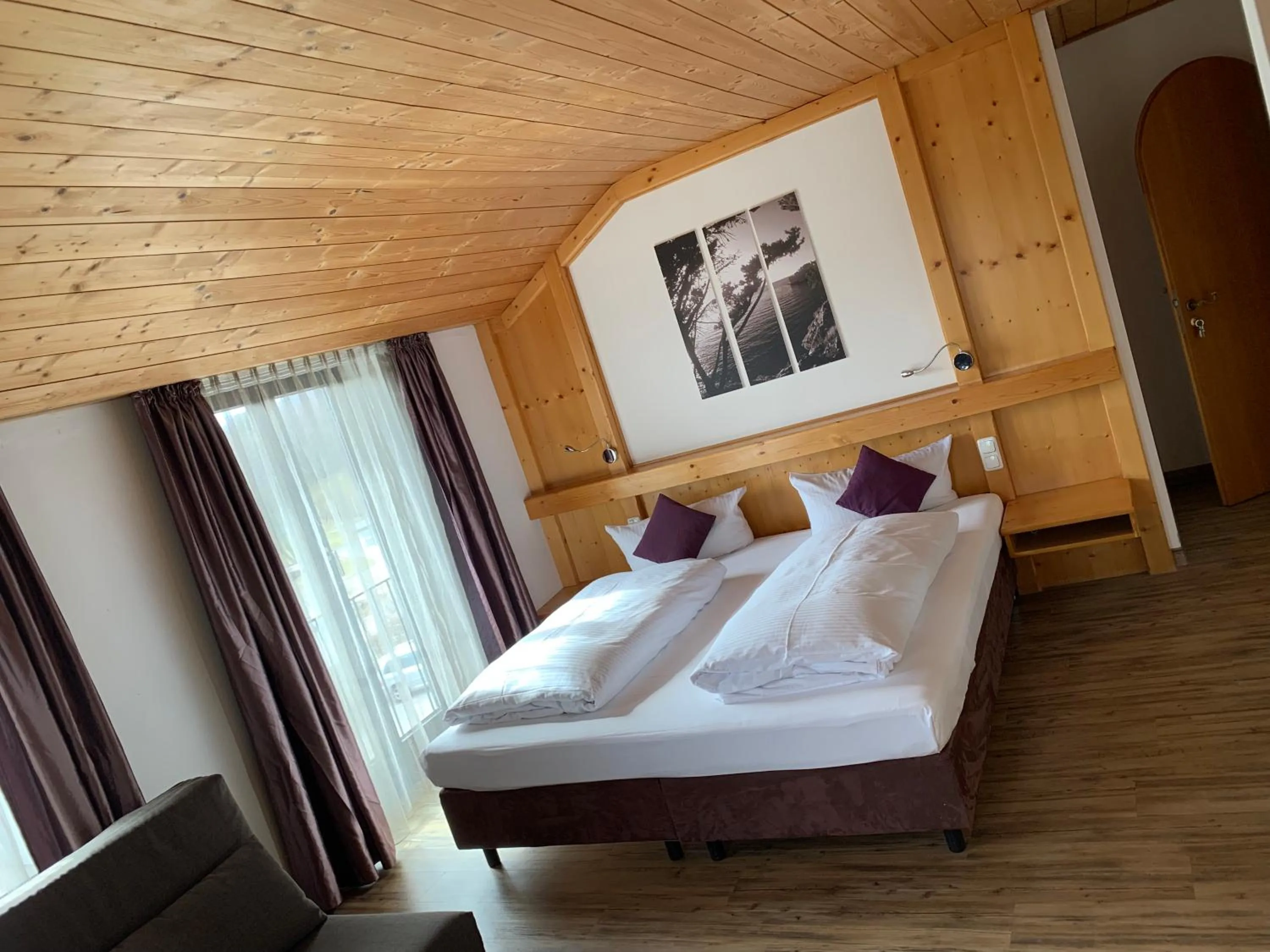 Photo of the whole room, Bed in Hotel Seeluna am Klostersee