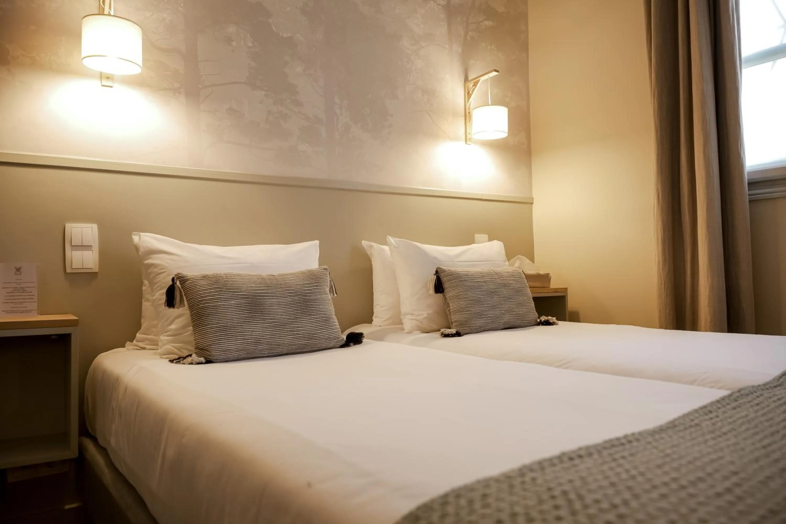 Bed in Hôtel de Biencourt