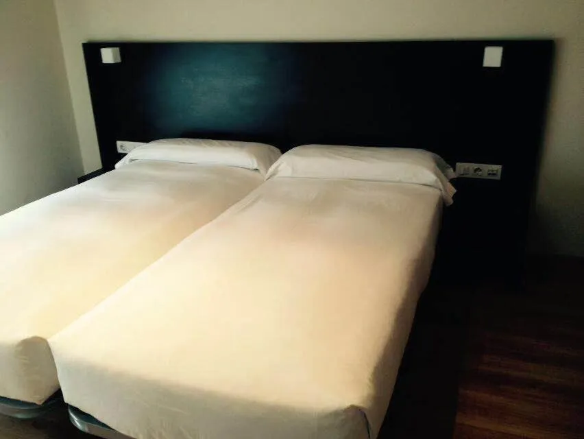 Bed in Aparthotel Jardines de Aristi