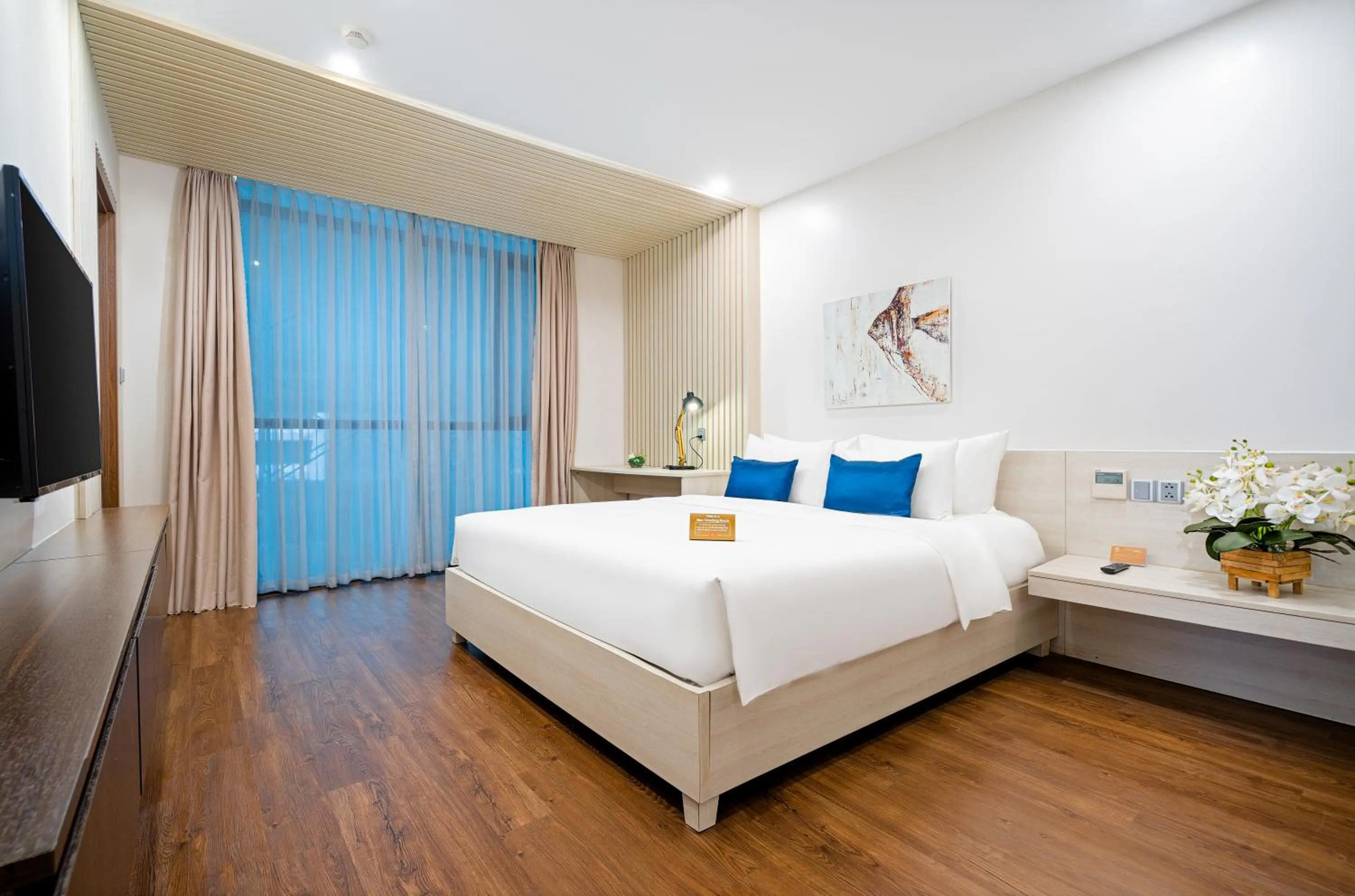 Bed in HAIAN Beach Hotel & Spa