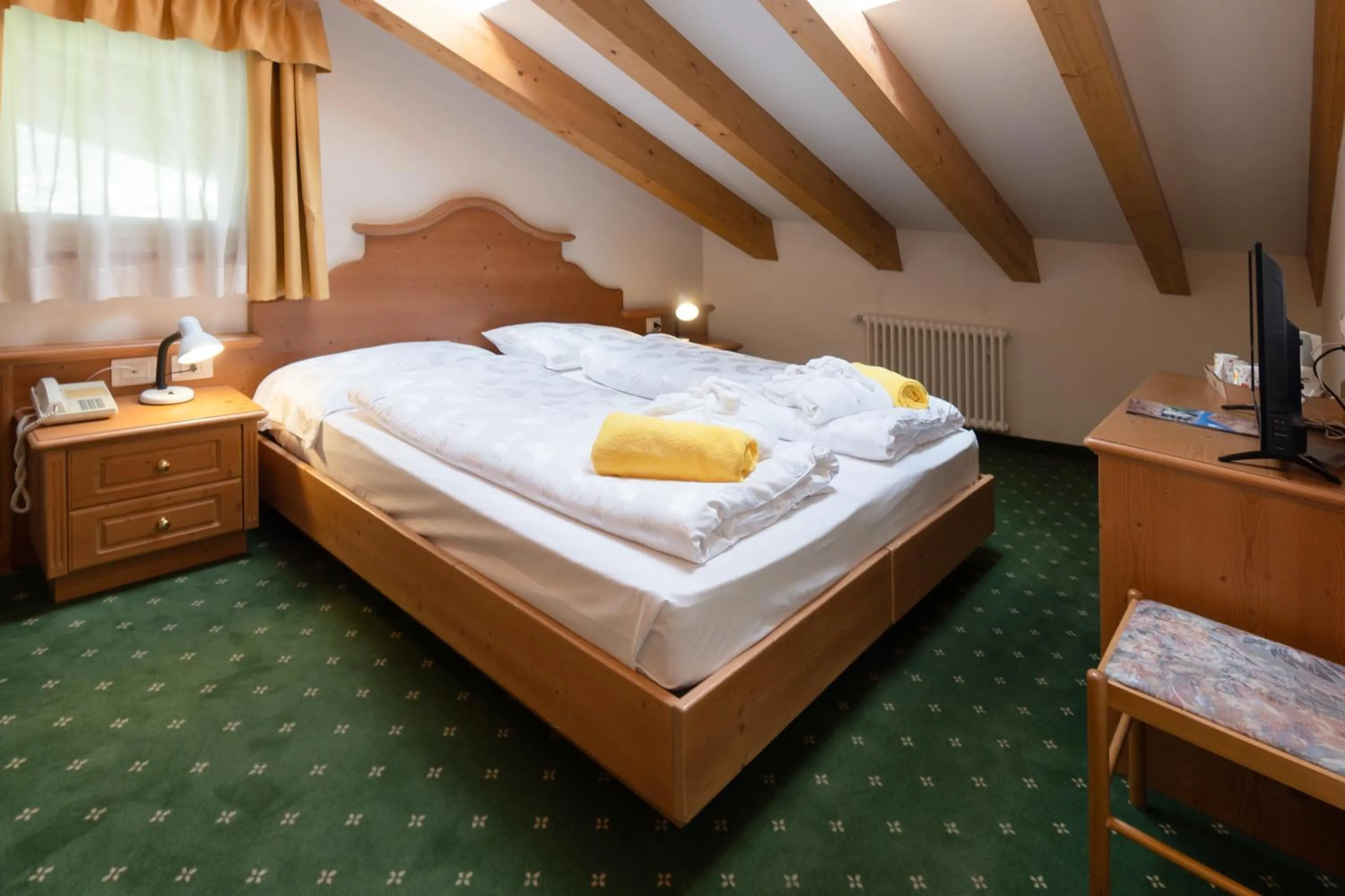 Bed in Hotel Fanes Suite & Spa