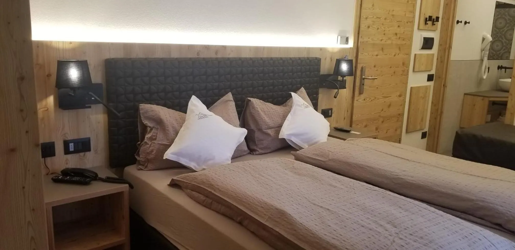 Bed in Cimon Dolomites Hotel