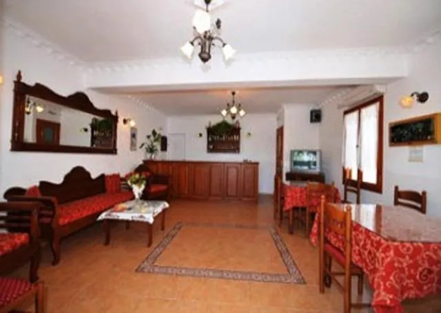 Communal lounge/ TV room in Villa Georgia