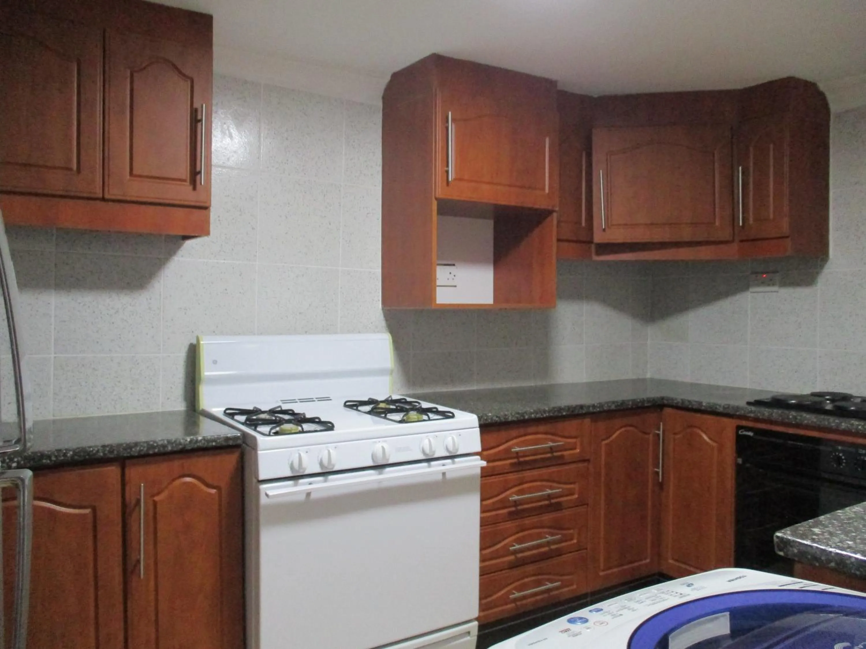 Kitchen or kitchenette in Avon Apartments