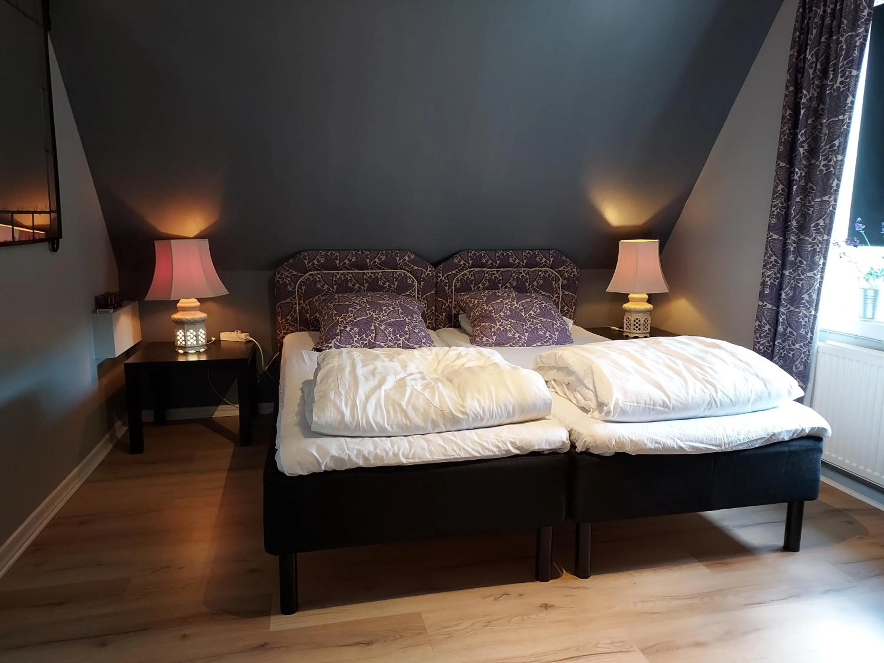 Bed in Älgbergets Bed & Breakfast