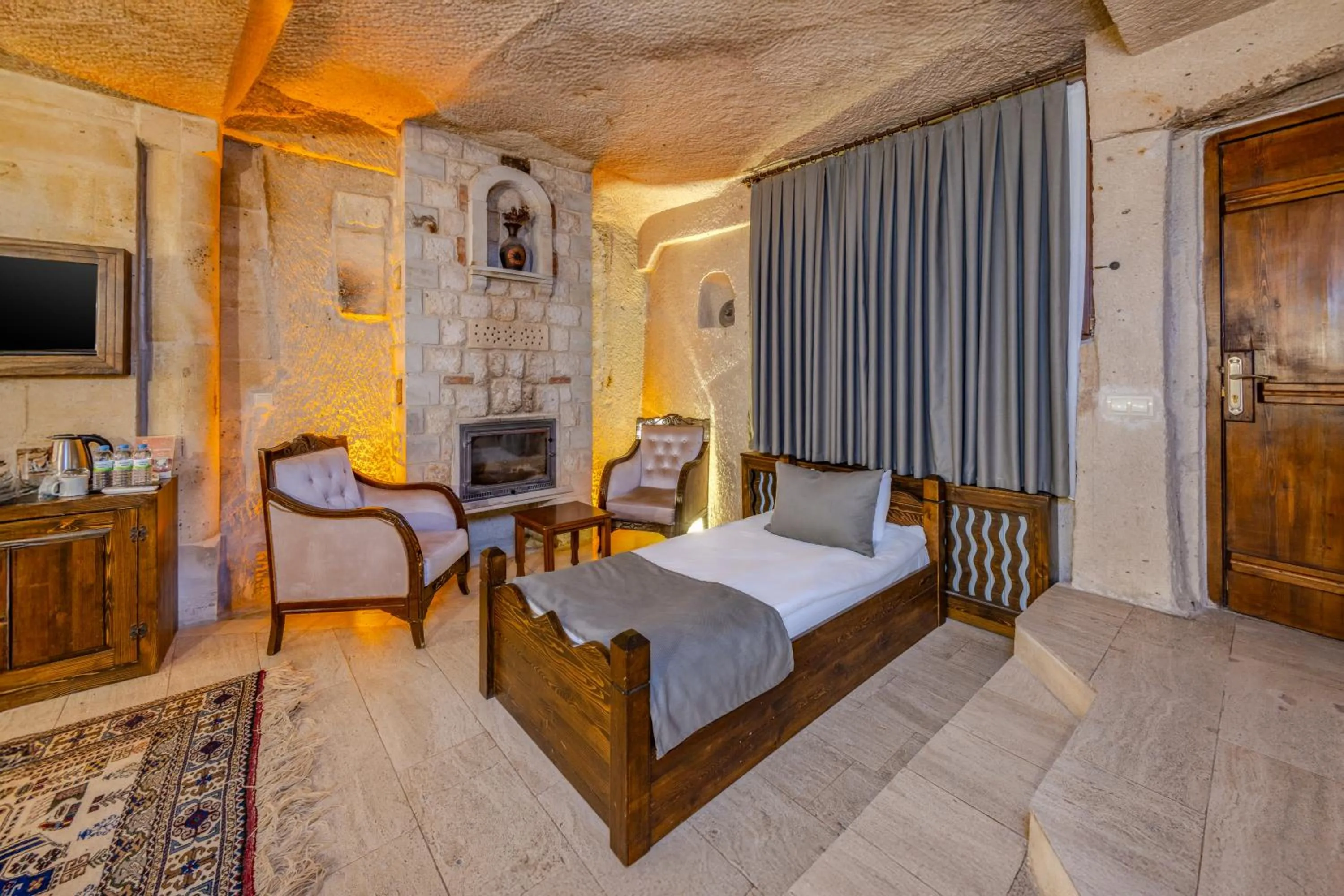 Bed in Castle Cave Hotel