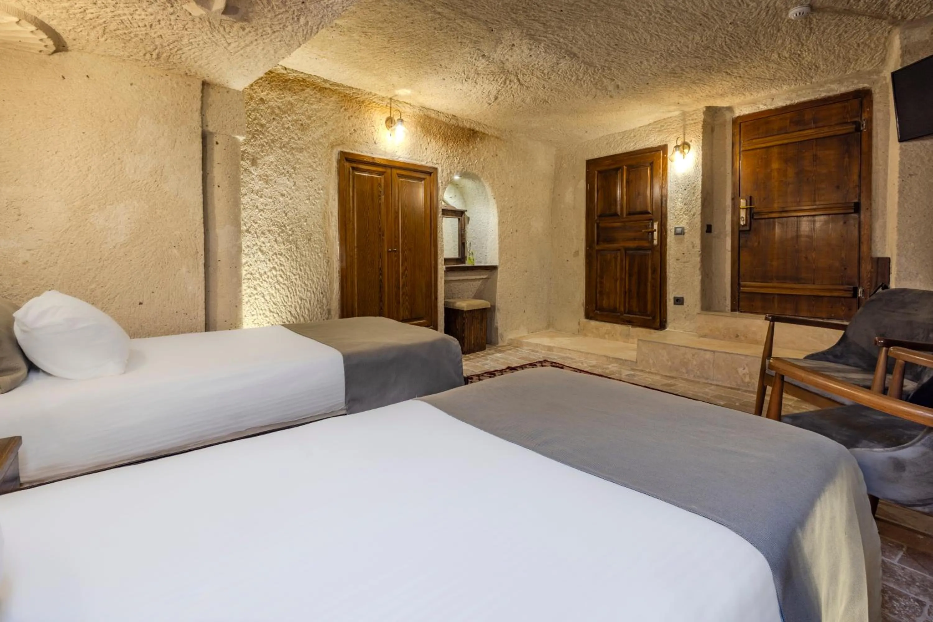 Bed in Castle Cave Hotel