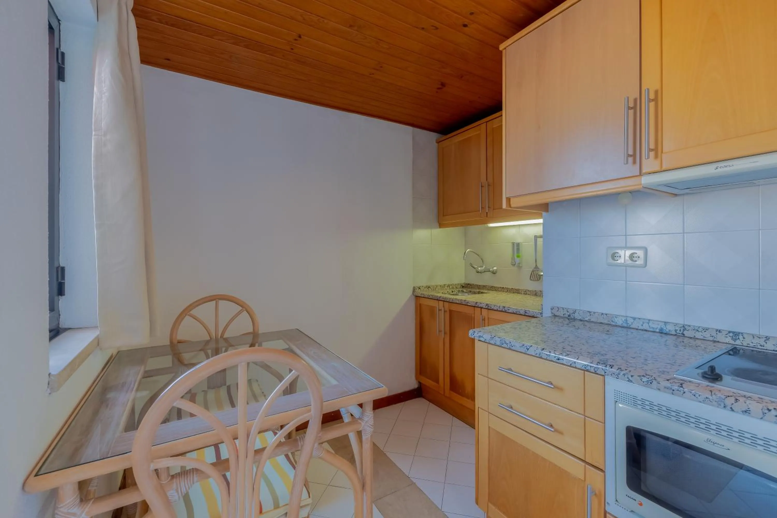 Kitchen or kitchenette in Muthu Oura Praia Hotel