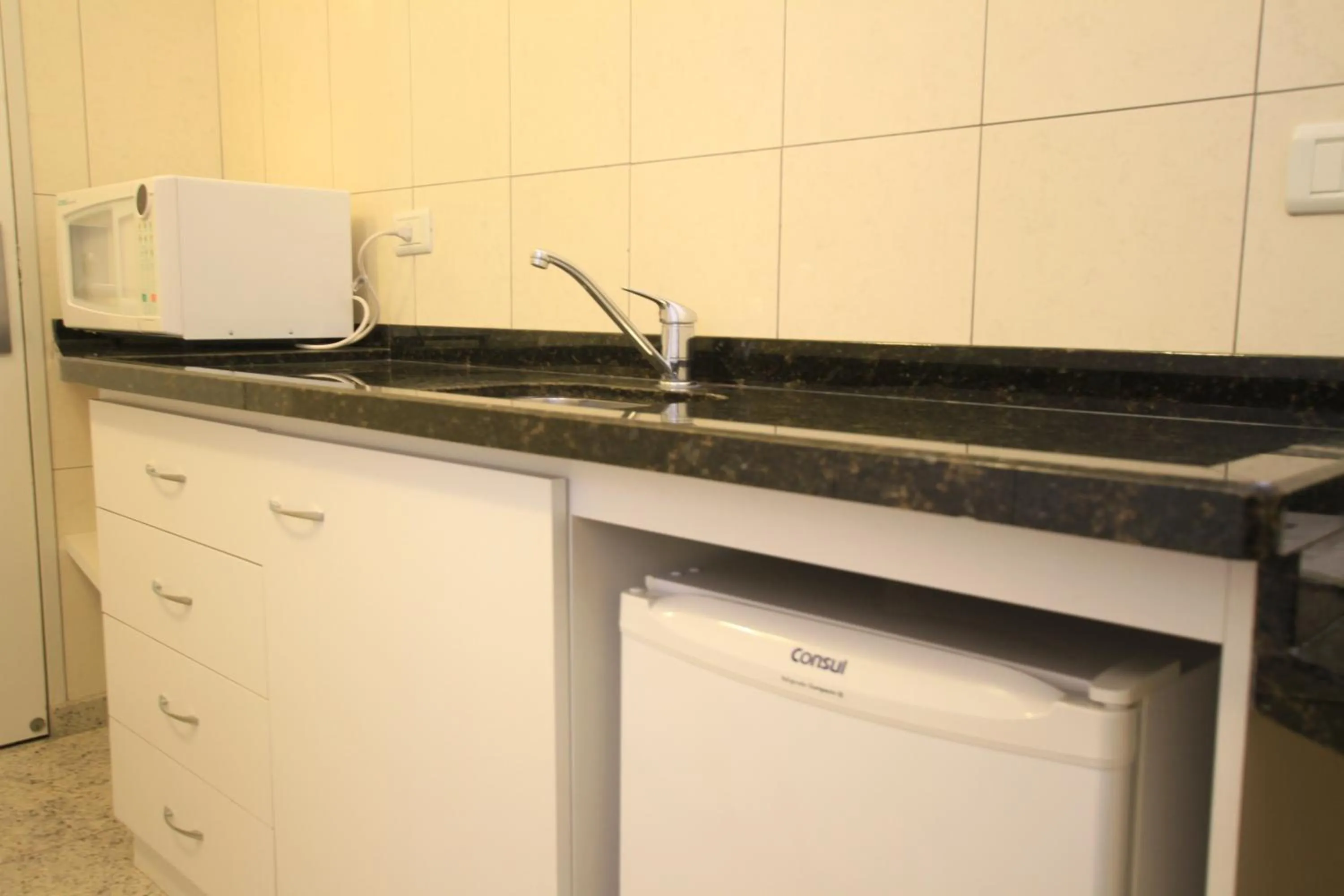 Kitchen or kitchenette in Hotel Confiance Prime Batel