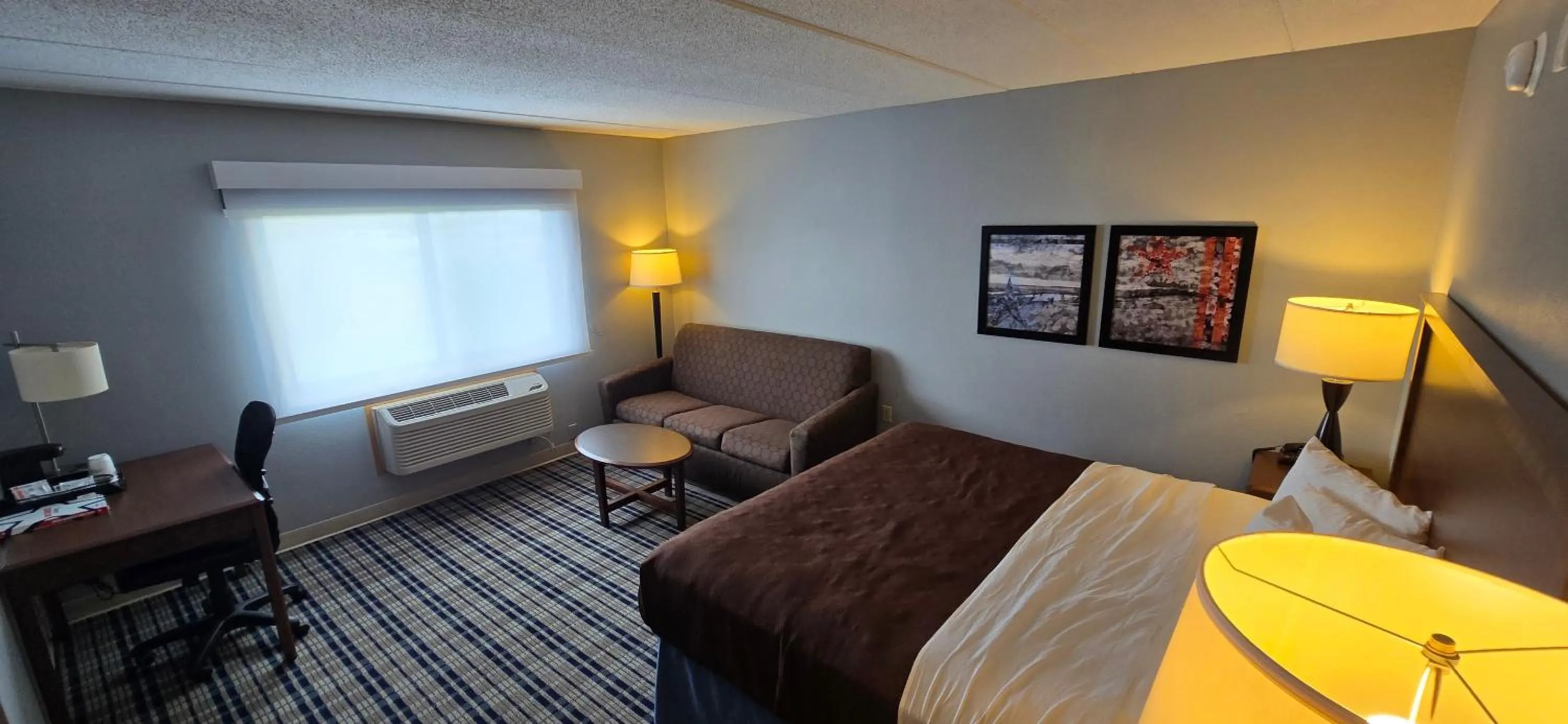 Guests, Bed in AmericInn by Wyndham Austin