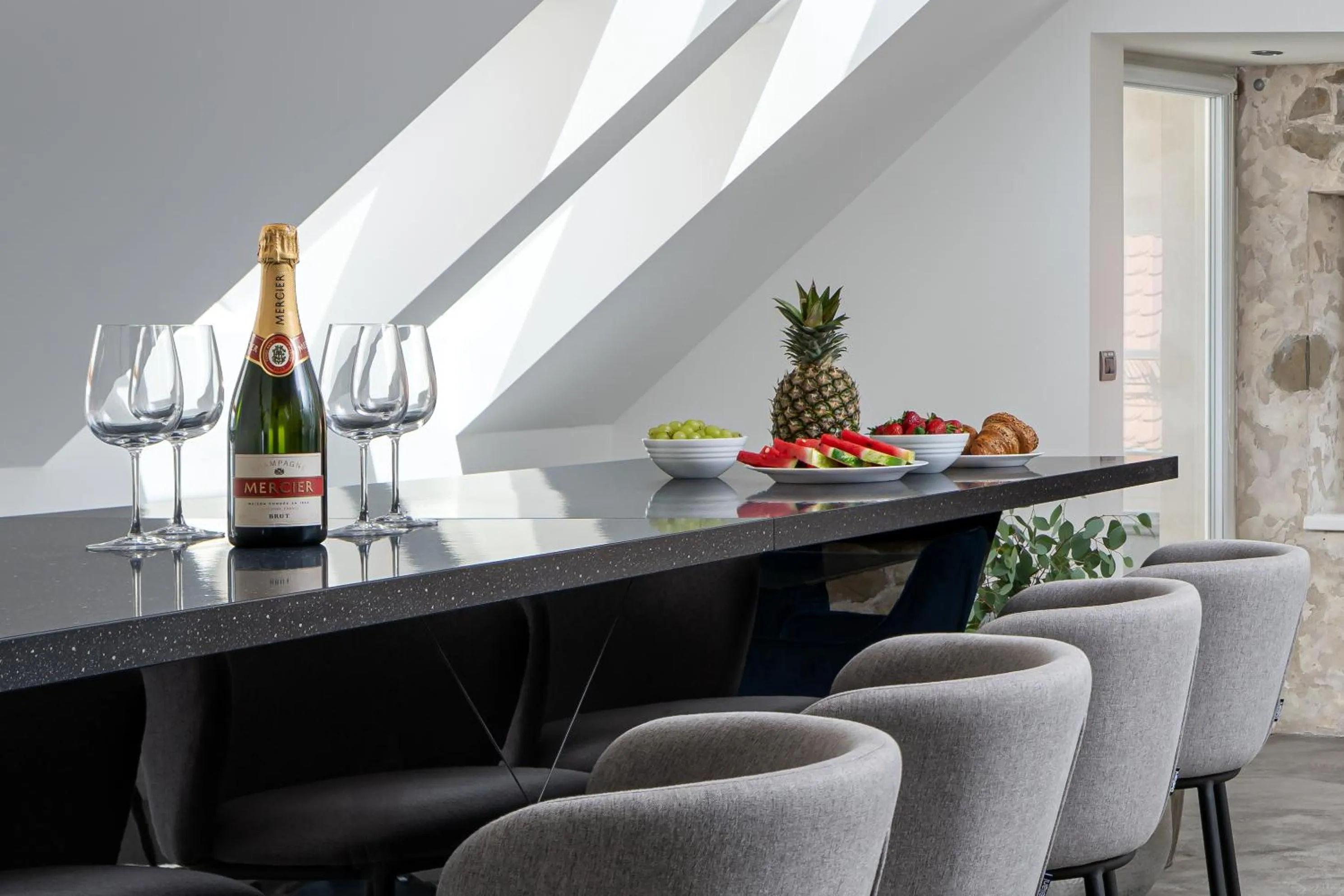 Seating area in Coco Chanel Boutique Apartment by Goodnite cz