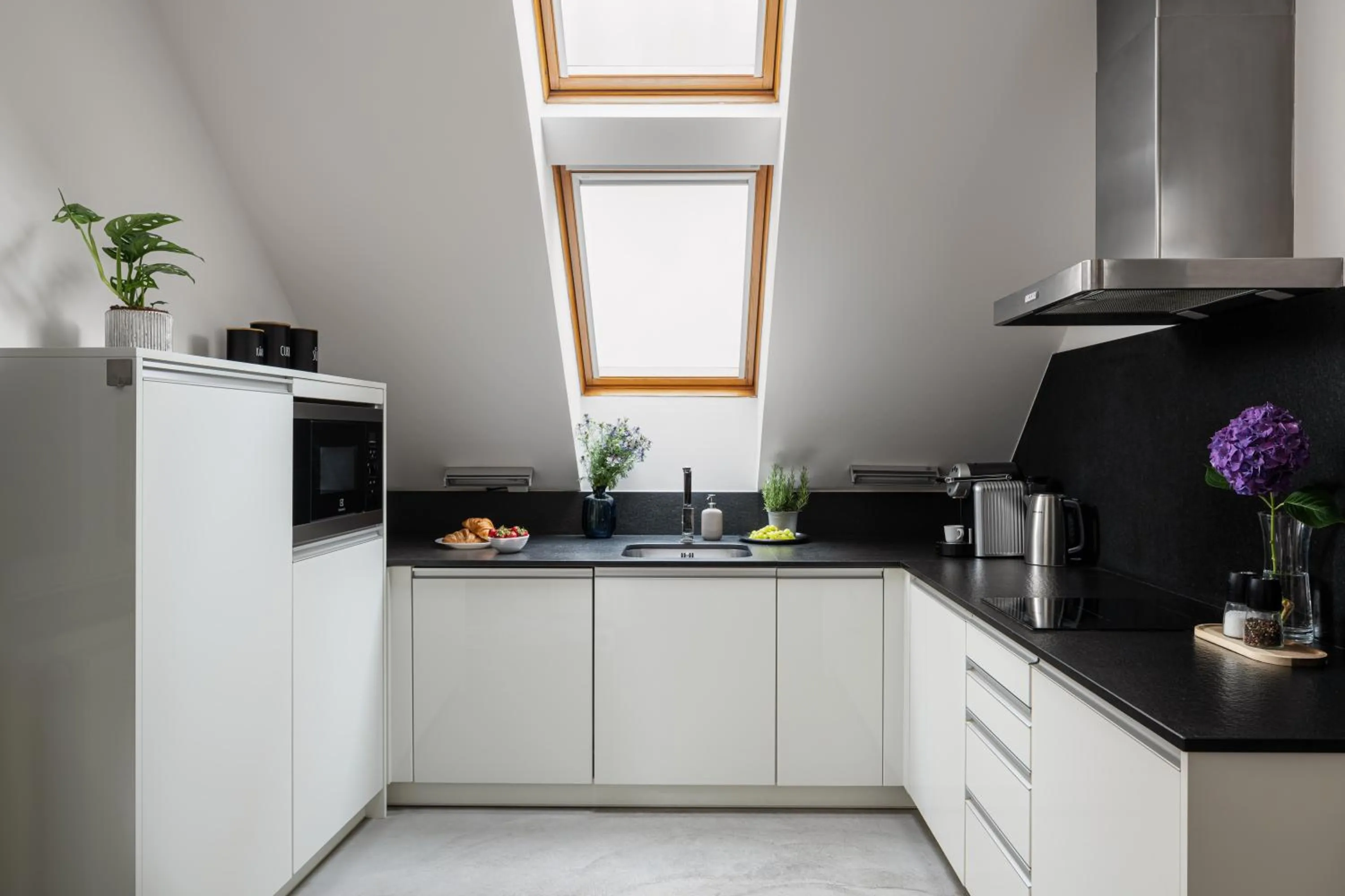 Kitchen or kitchenette in Coco Chanel Boutique Apartment by Goodnite cz