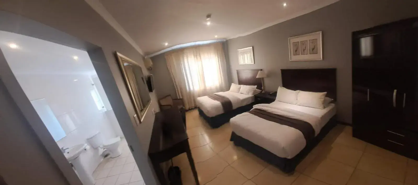 Family Room (2 Adults + 2 Children) in Villa Via Hotel Midrand Family Room (2 Adults + 2 Children) in Villa Via Hotel Midrand