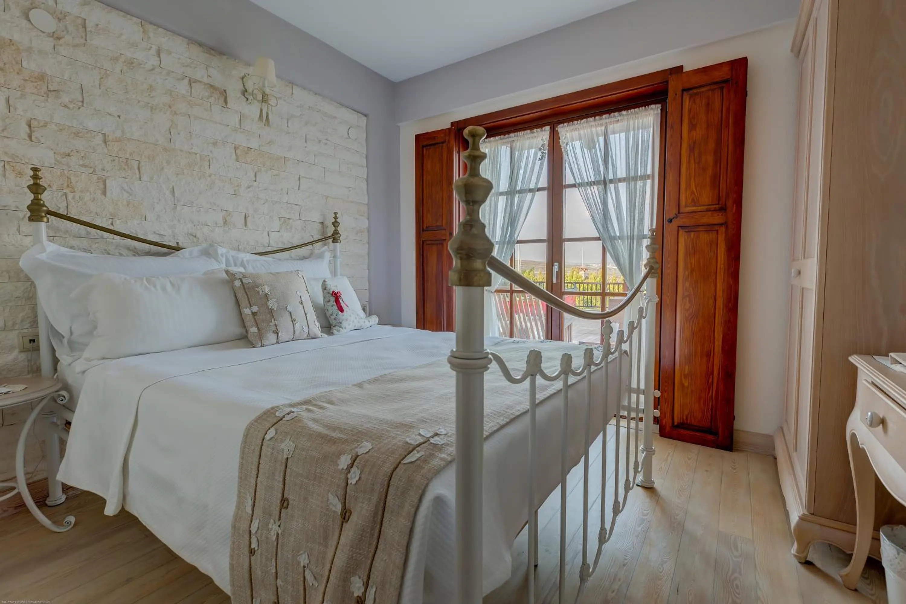 Balcony/Terrace, Bed in Alacati Kapari Hotel - Special Category