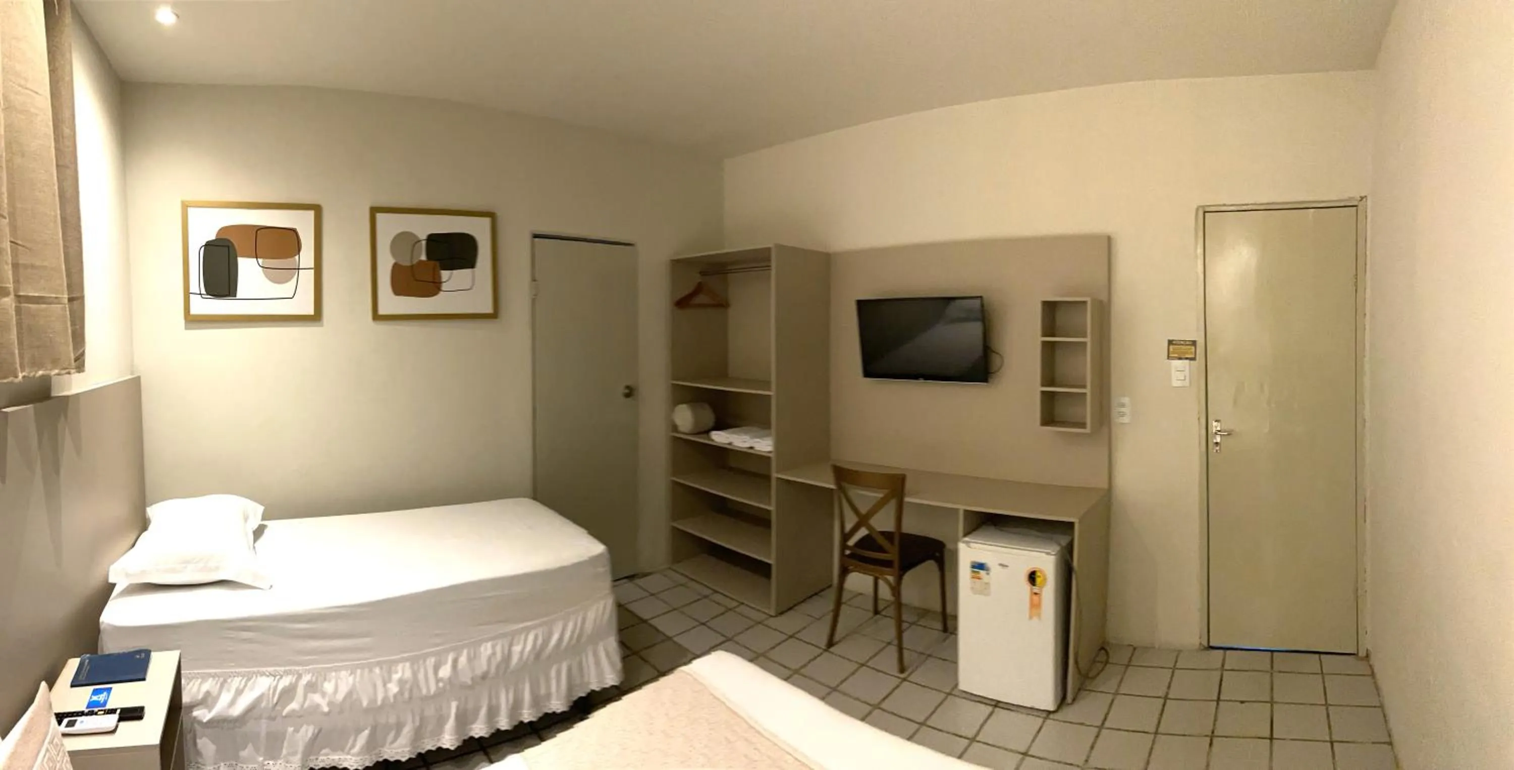 Bed in Center Plaza Hotel