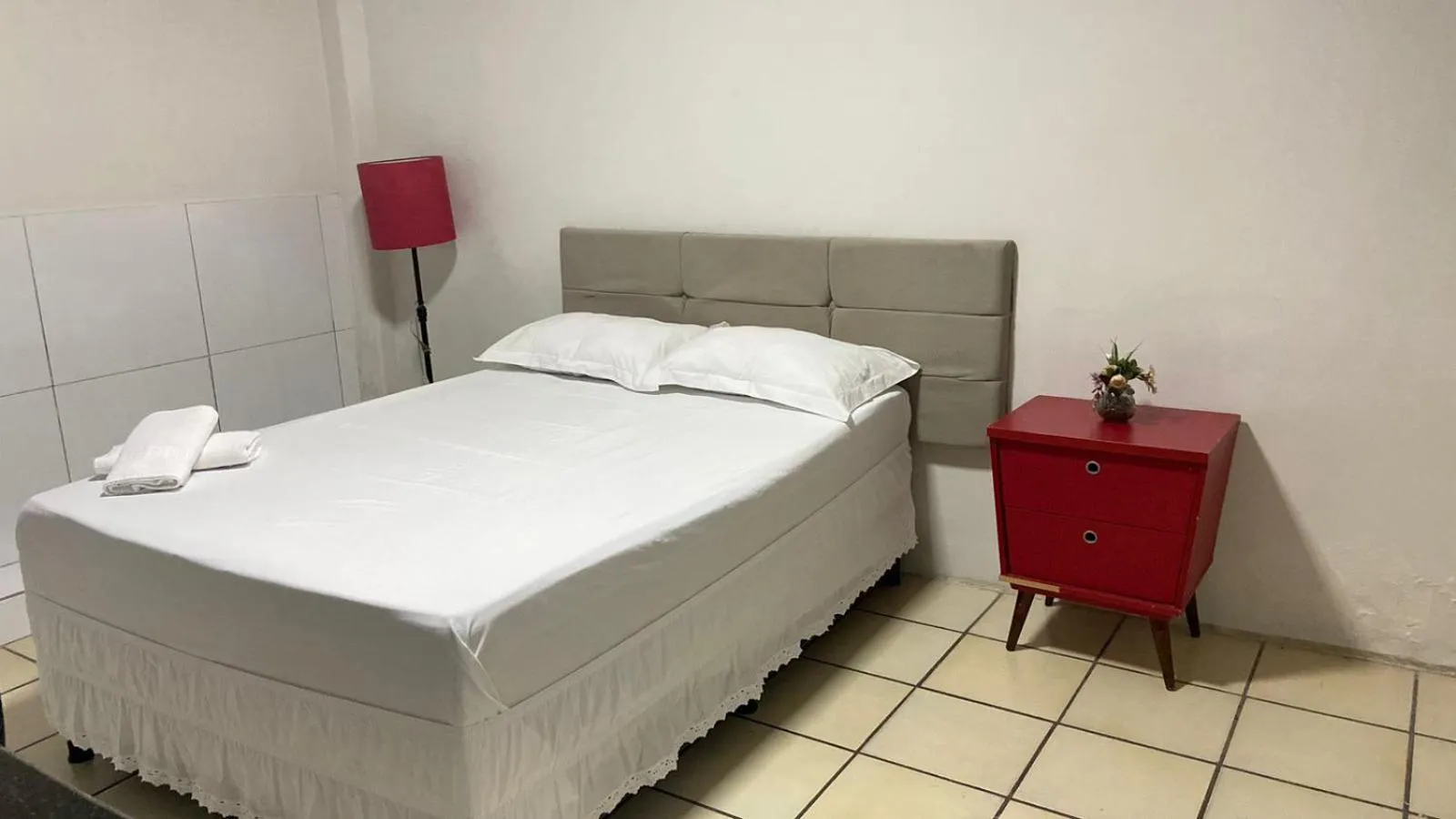 Bed in Center Plaza Hotel