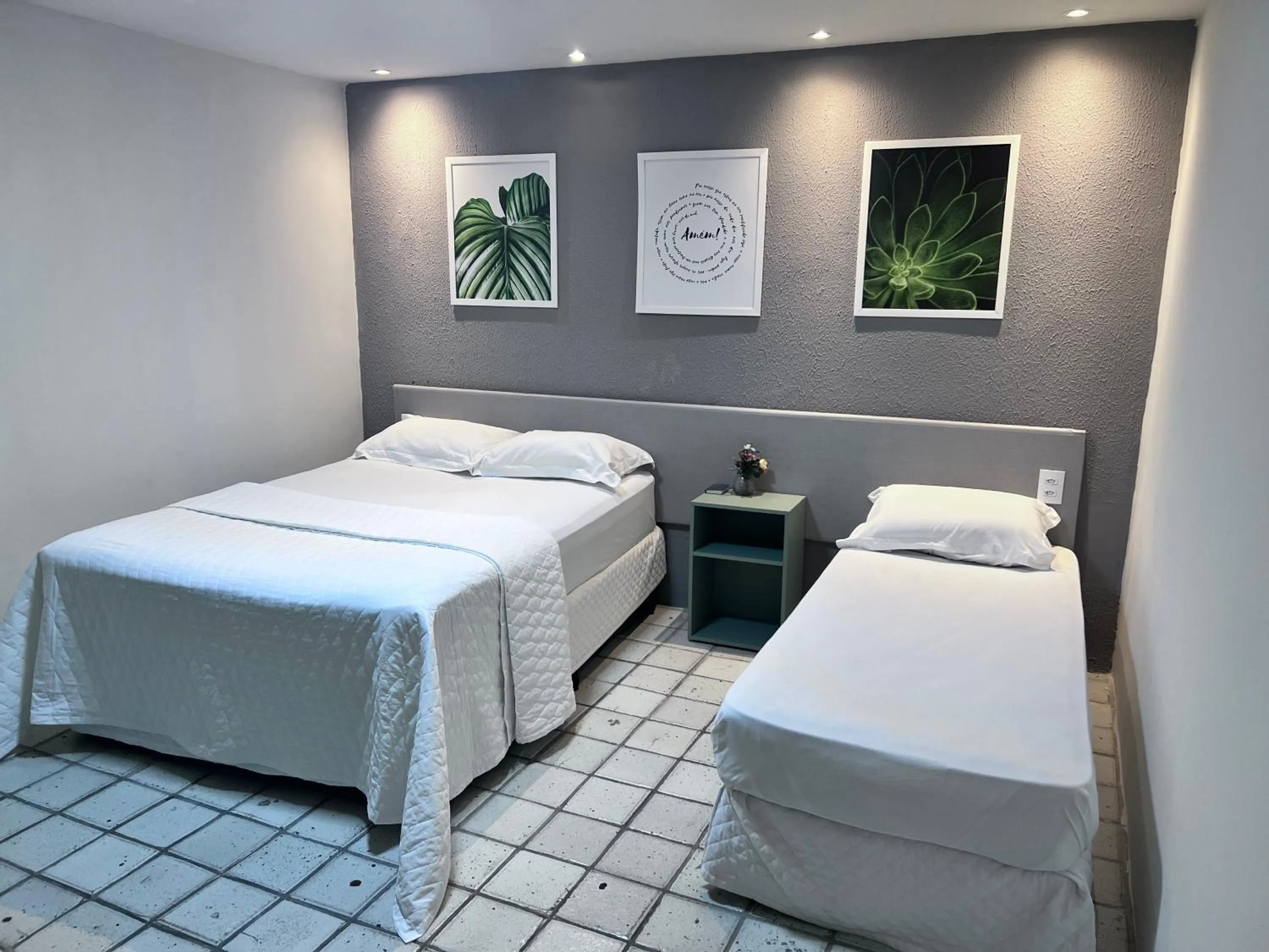 Bed in Center Plaza Hotel