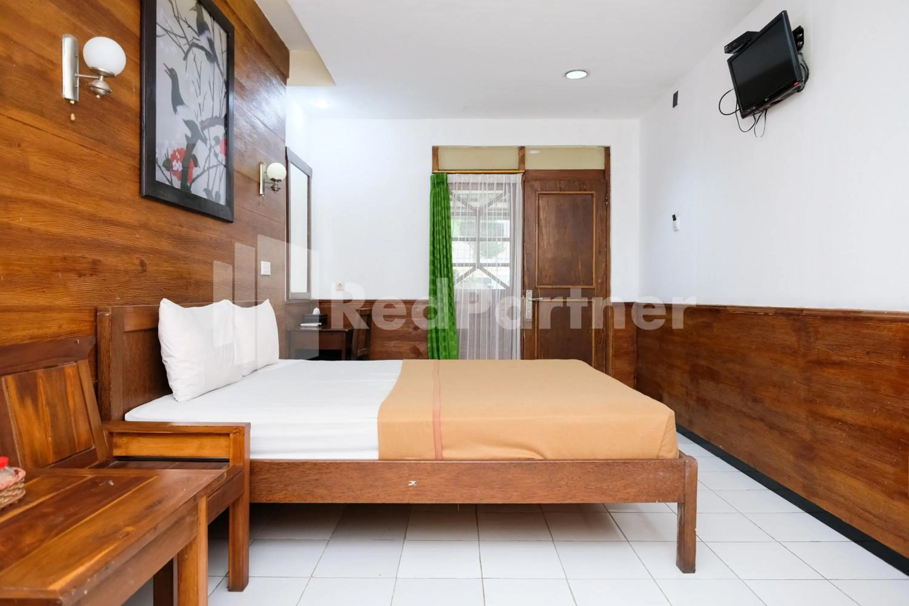 Bedroom, Bed in The Soemarsono Hotel near Ambarrukmo Plaza Mall RedPartner