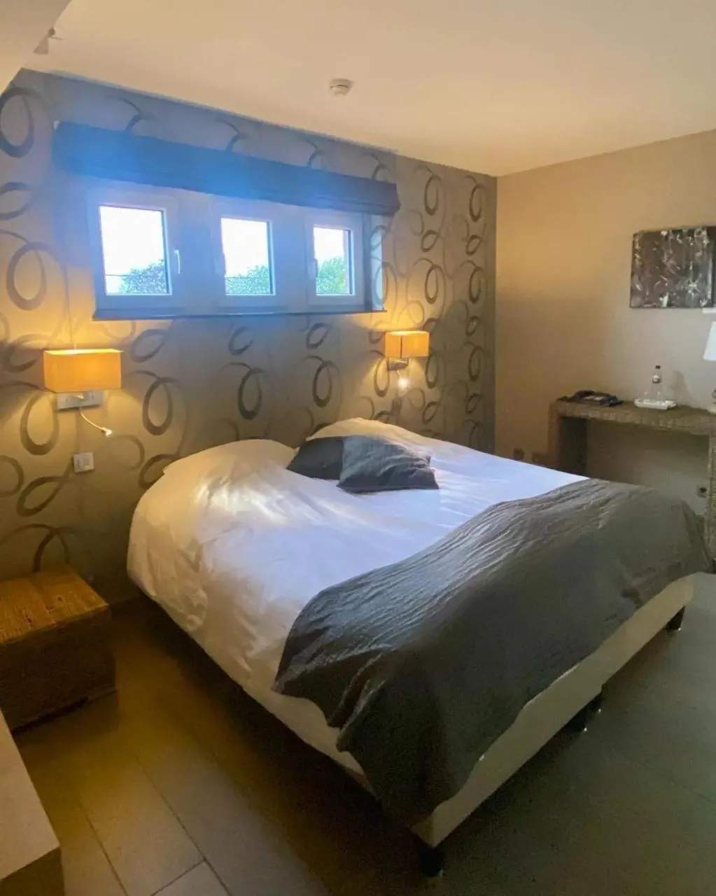 Bed in Hotel L'Ami du Chambertin