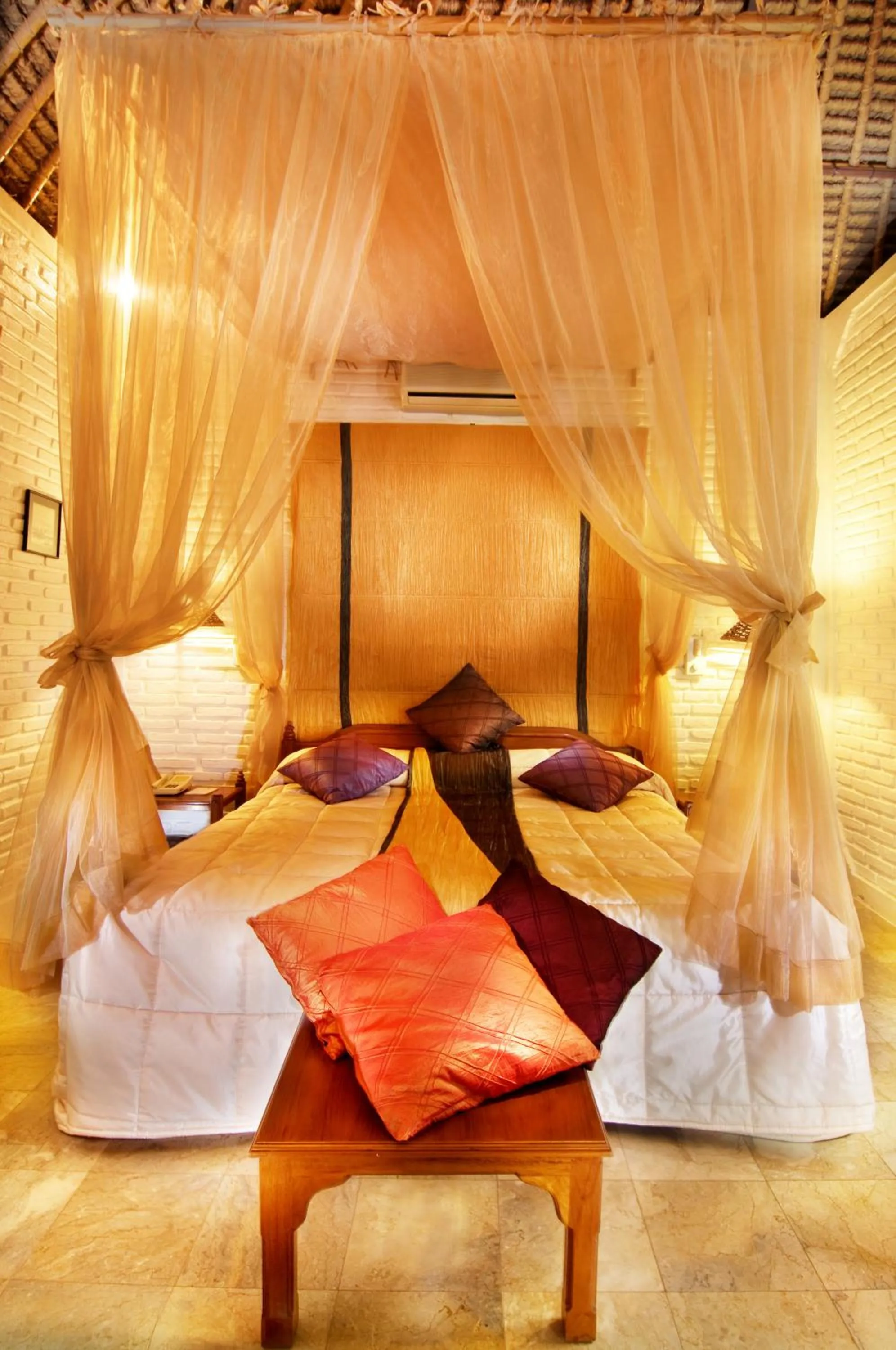 Bed in The Water Garden Hotel