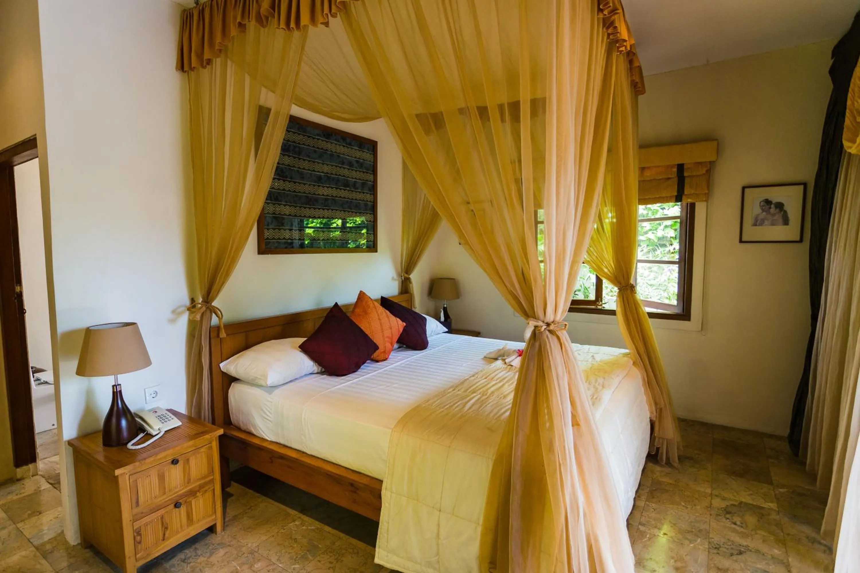 Bed in The Water Garden Hotel