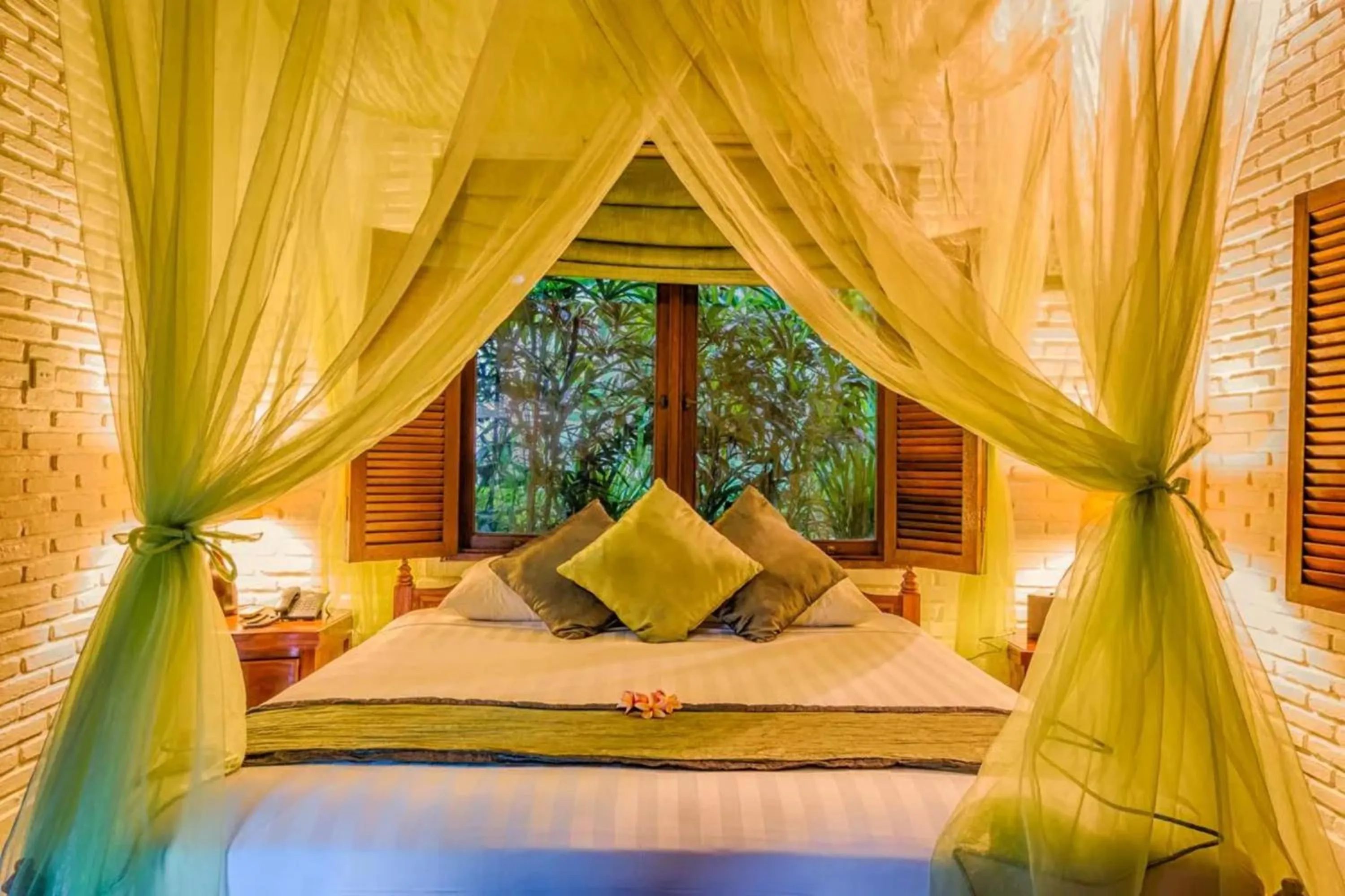 Bed in The Water Garden Hotel