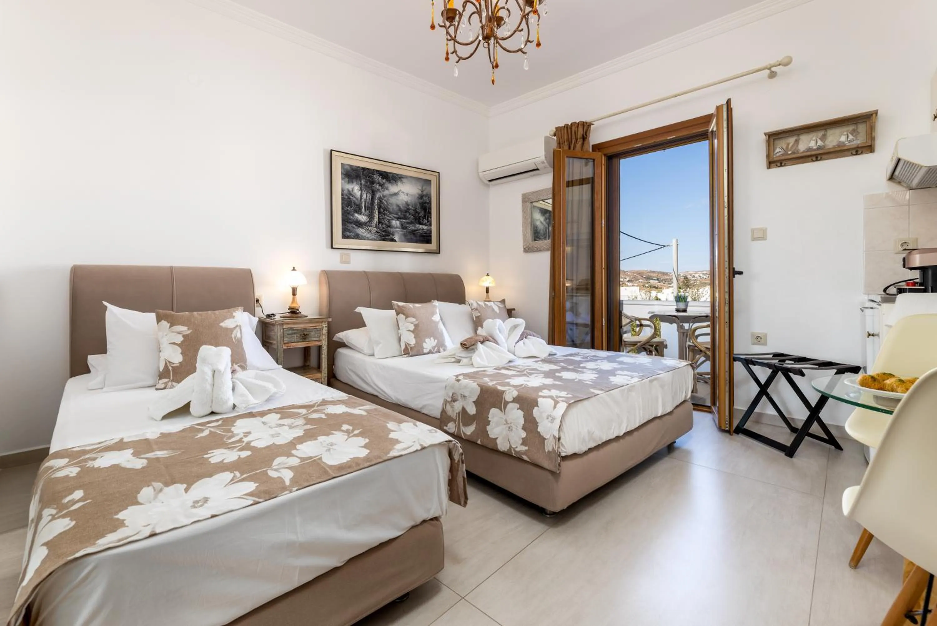 Bed in Panos Luxury Studios