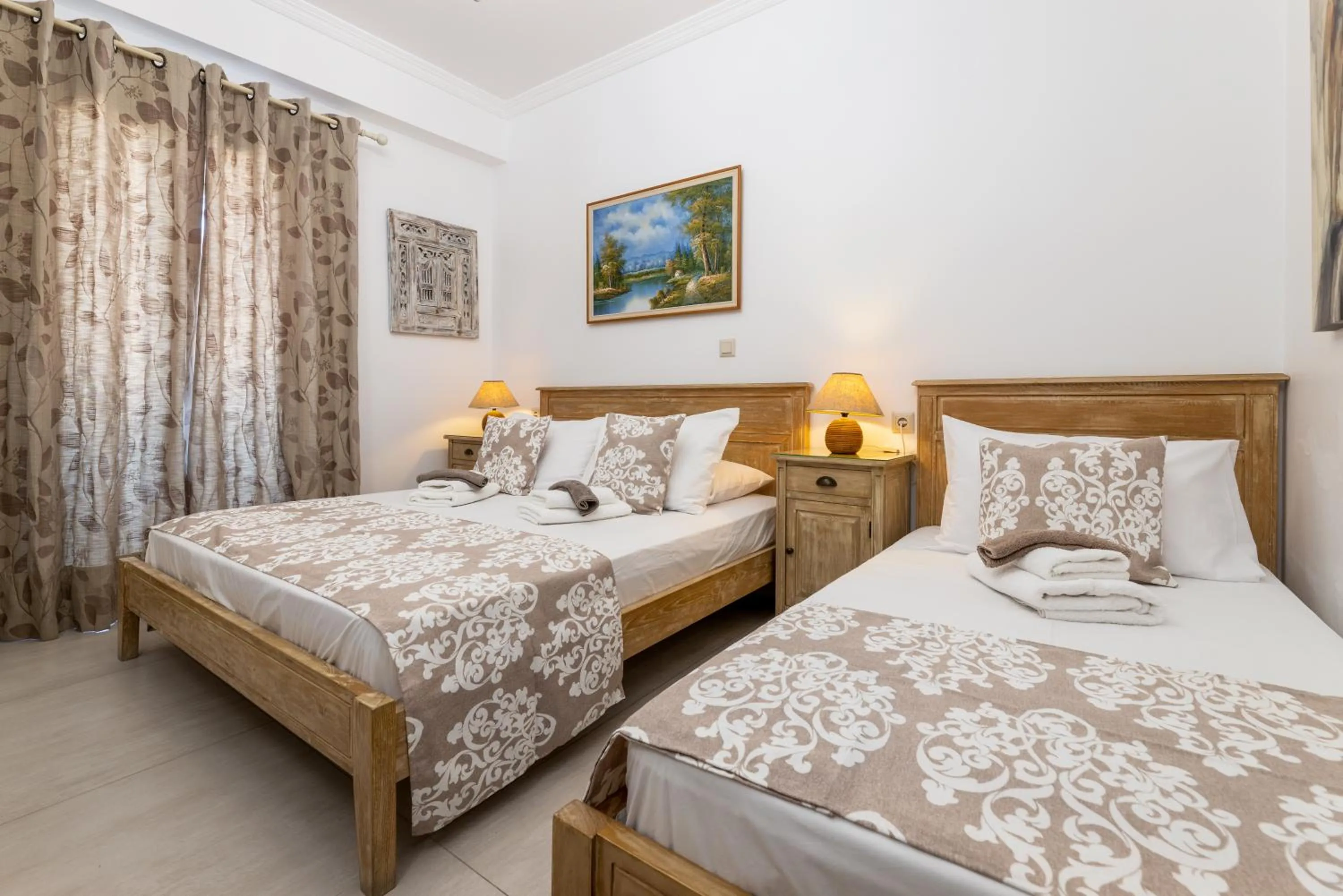 Bed in Panos Luxury Studios