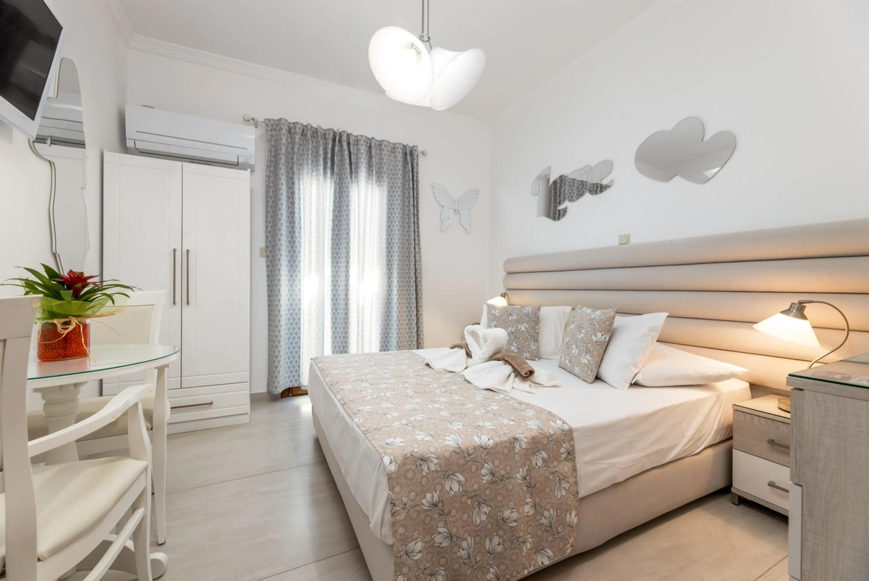 Bed in Panos Luxury Studios